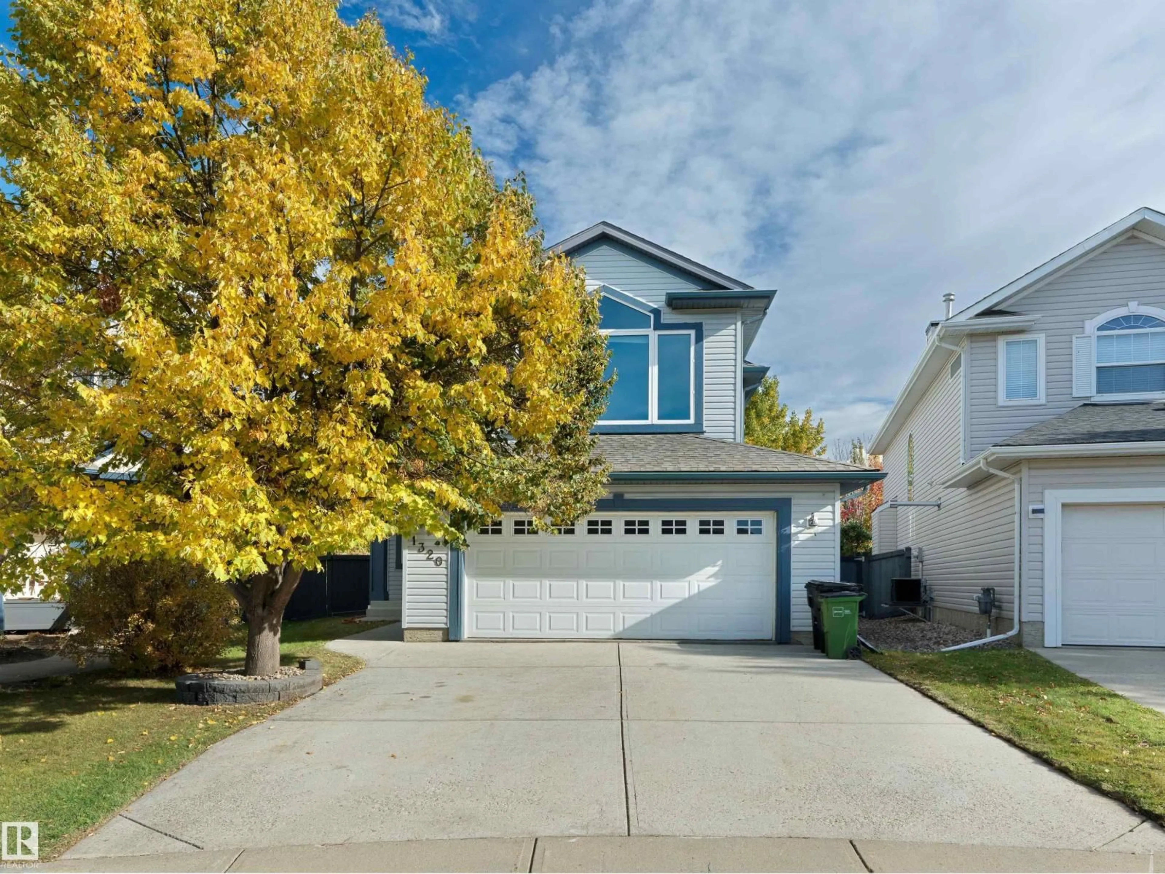 Home with vinyl exterior material, street for 1320 BARNES CL, Edmonton Alberta T6W1G6