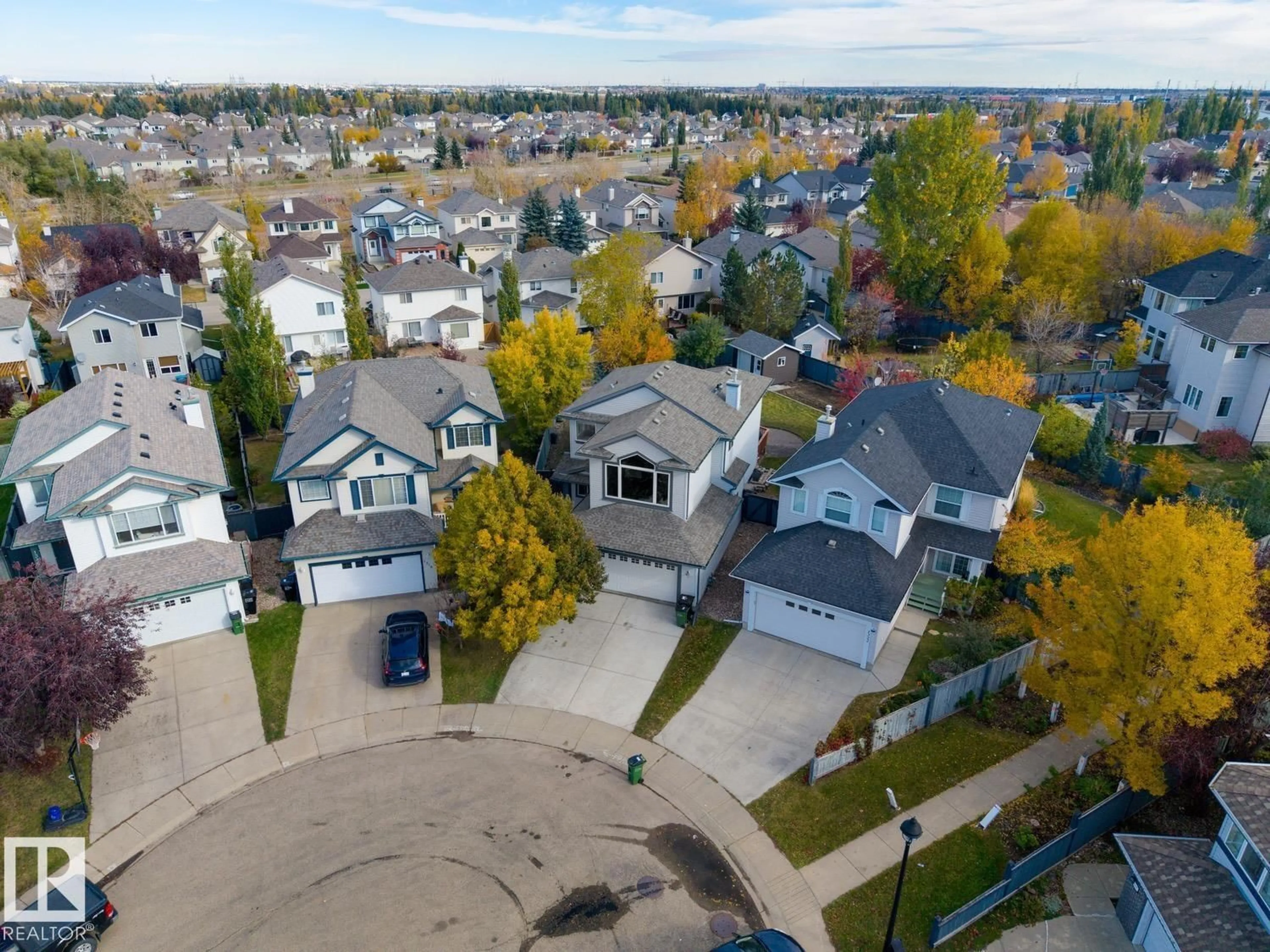 A pic from outside/outdoor area/front of a property/back of a property/a pic from drone, street for 1320 BARNES CL, Edmonton Alberta T6W1G6