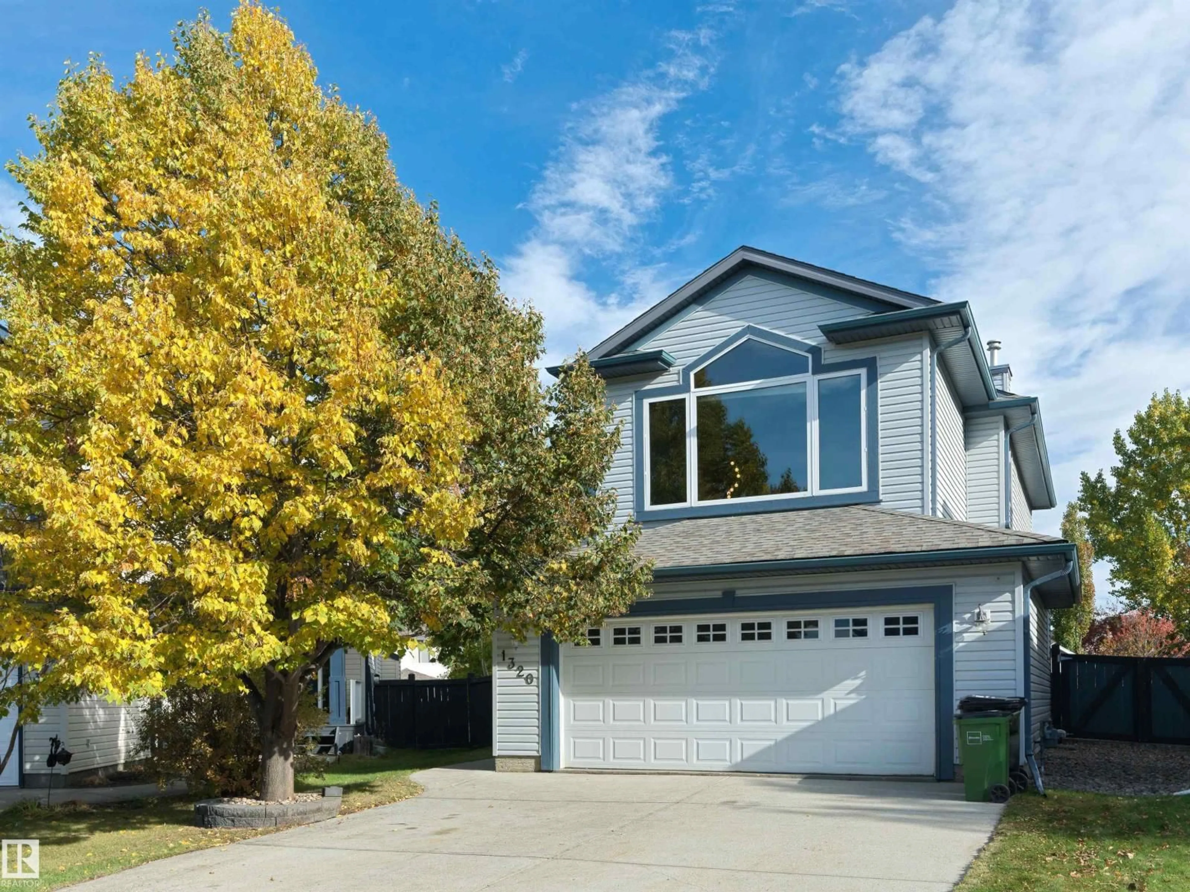 Home with vinyl exterior material, street for 1320 BARNES CL, Edmonton Alberta T6W1G6