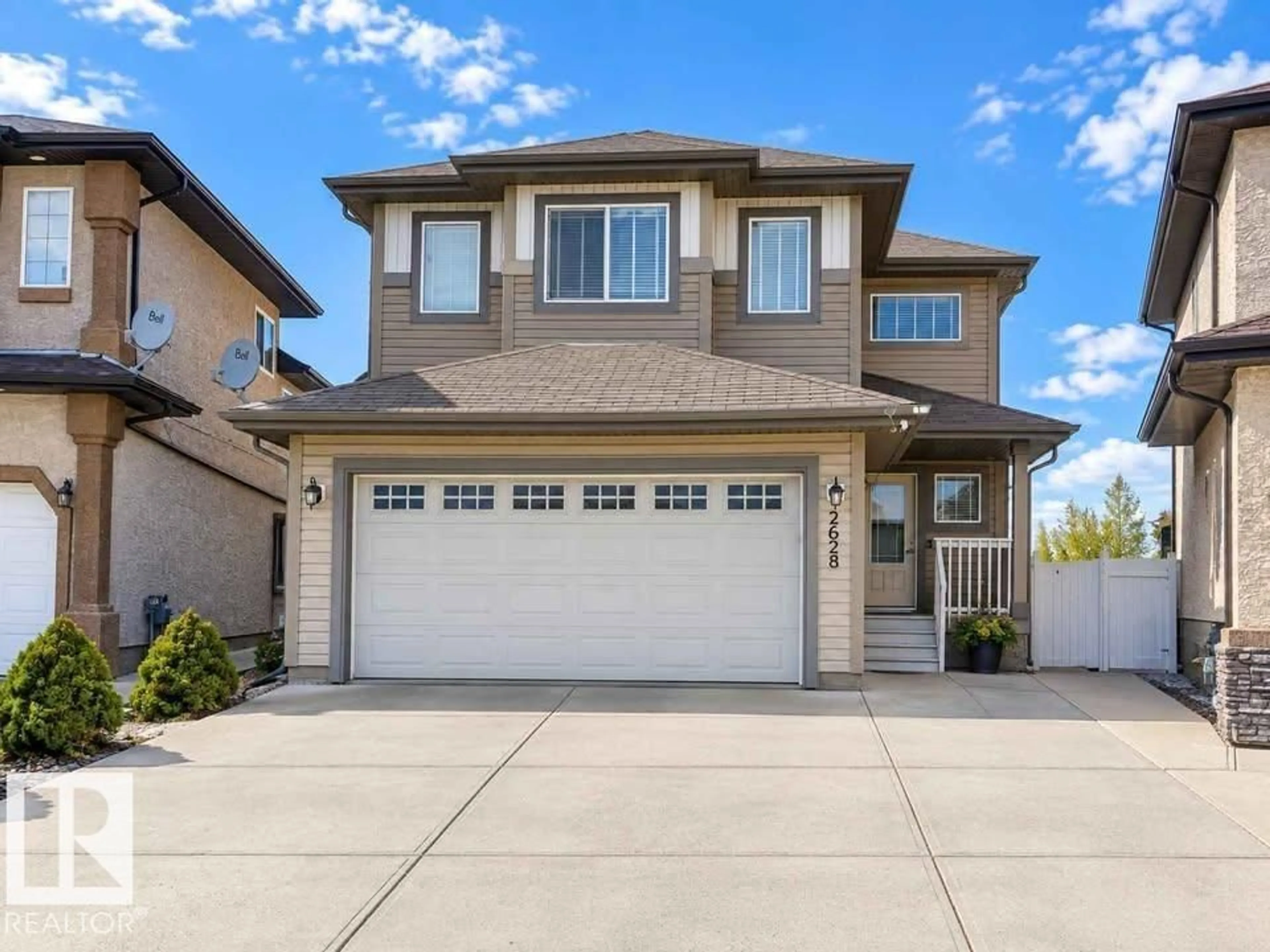 Home with vinyl exterior material, street for 2628 30 ST, Edmonton Alberta T6T0H6