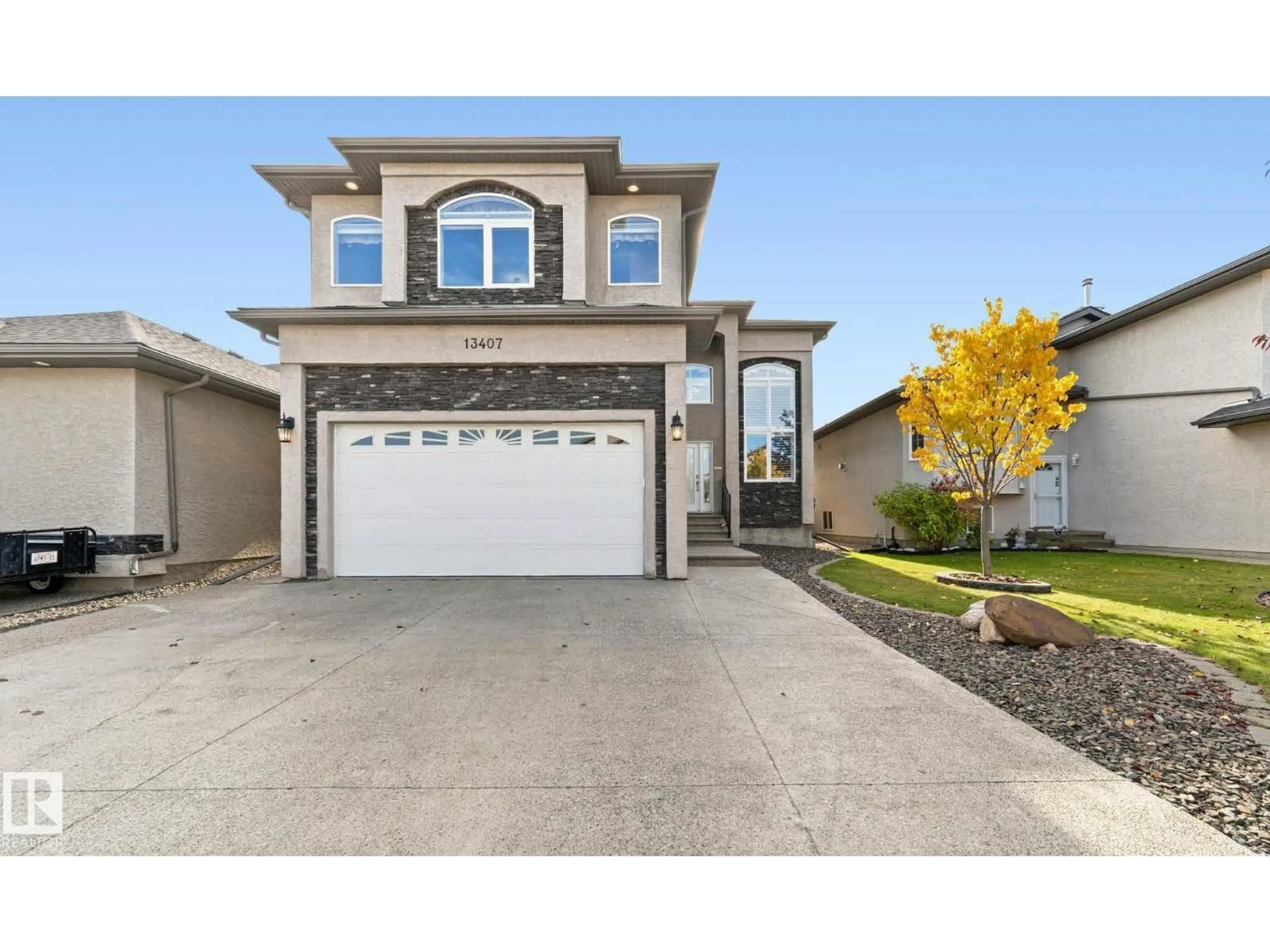 Home with vinyl exterior material, street for 13407 161 AV, Edmonton Alberta T6V0B9