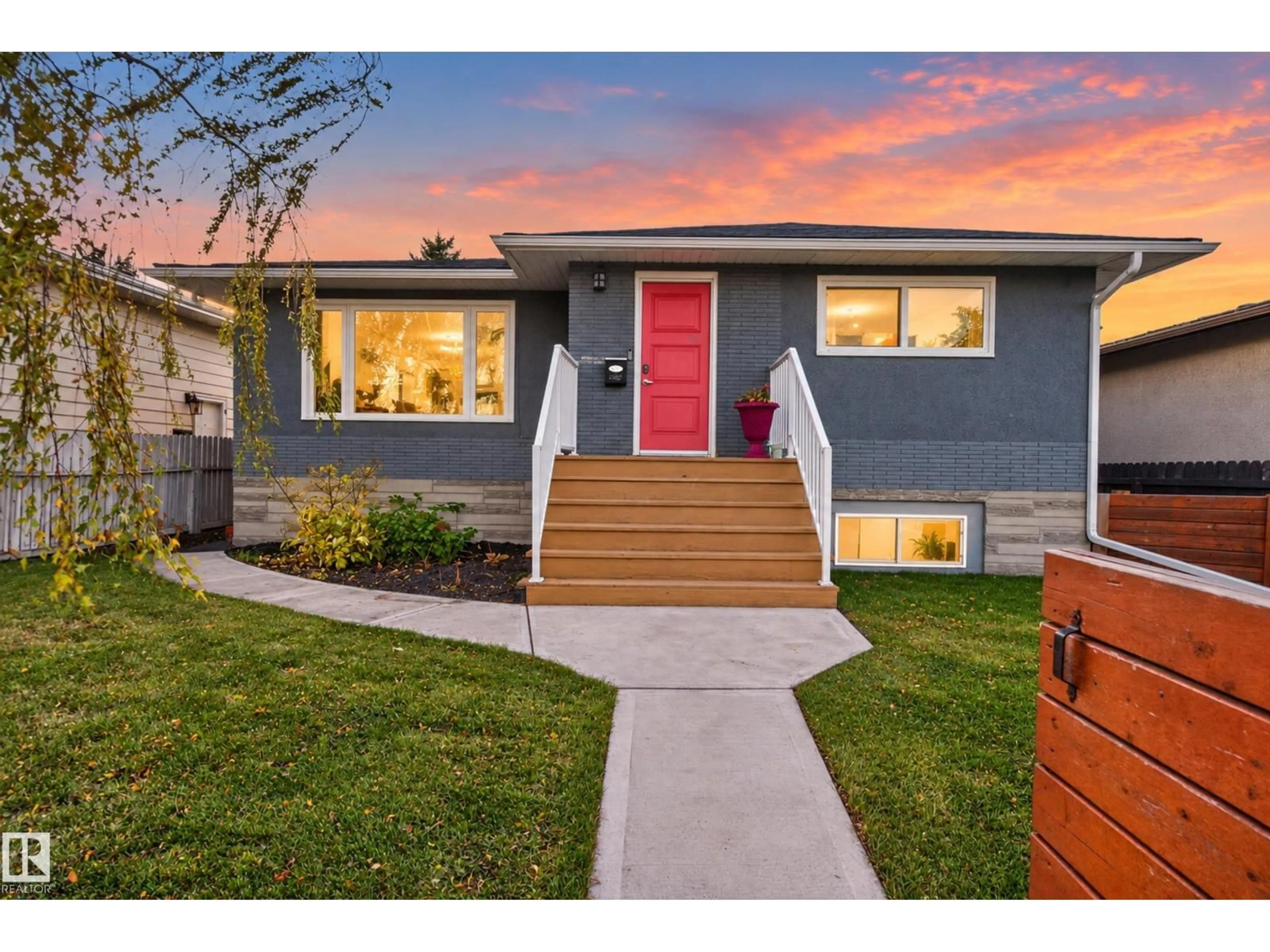 Home with vinyl exterior material, street for 9814 79 ST, Edmonton Alberta T6A3G1
