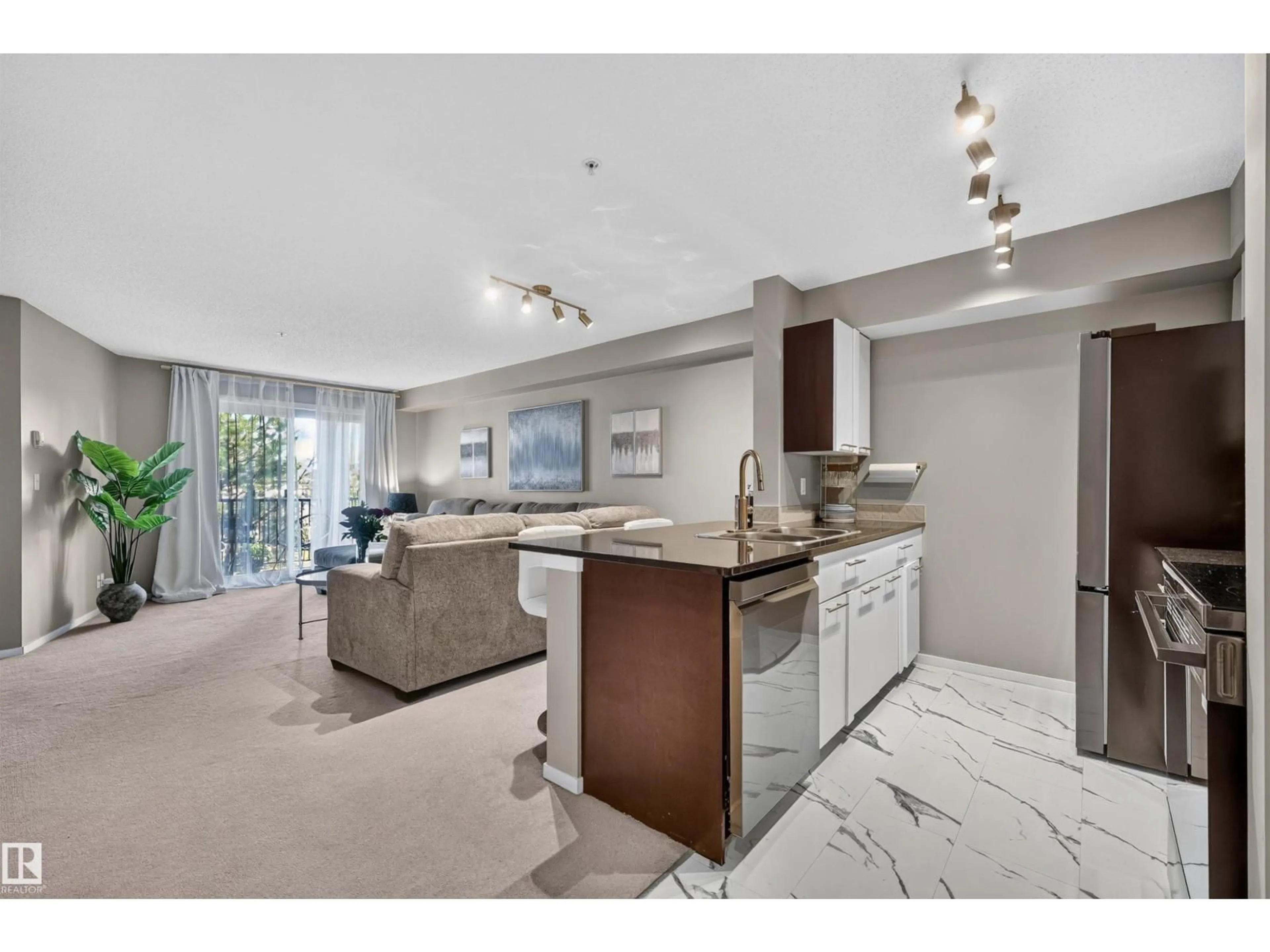 Open concept kitchen, unknown for 217 - 3207 JAMES MOWATT TR, Edmonton Alberta T6W3L6