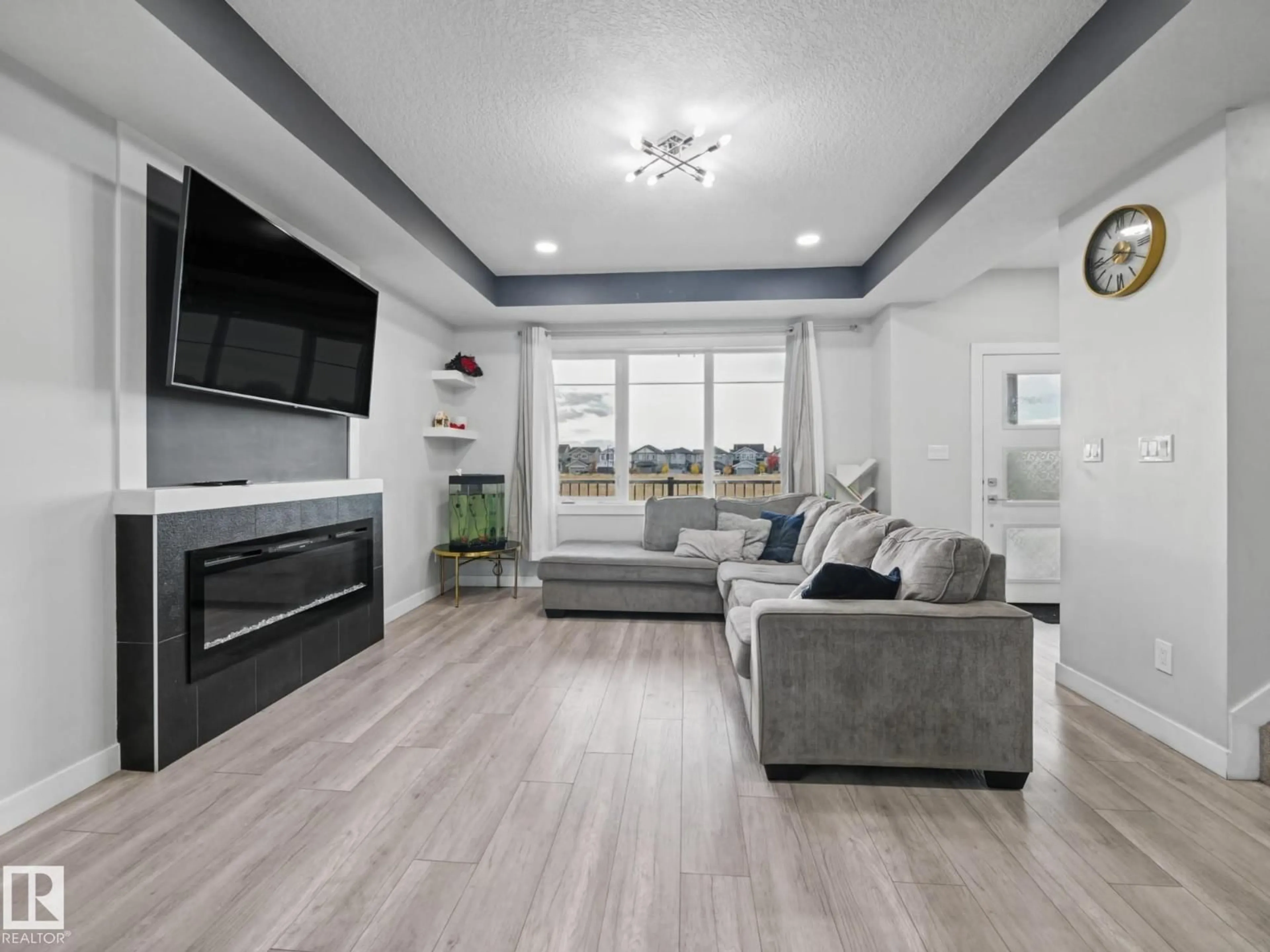 Living room with furniture, unknown for NW - 20625 99B AV, Edmonton Alberta T5T7N3