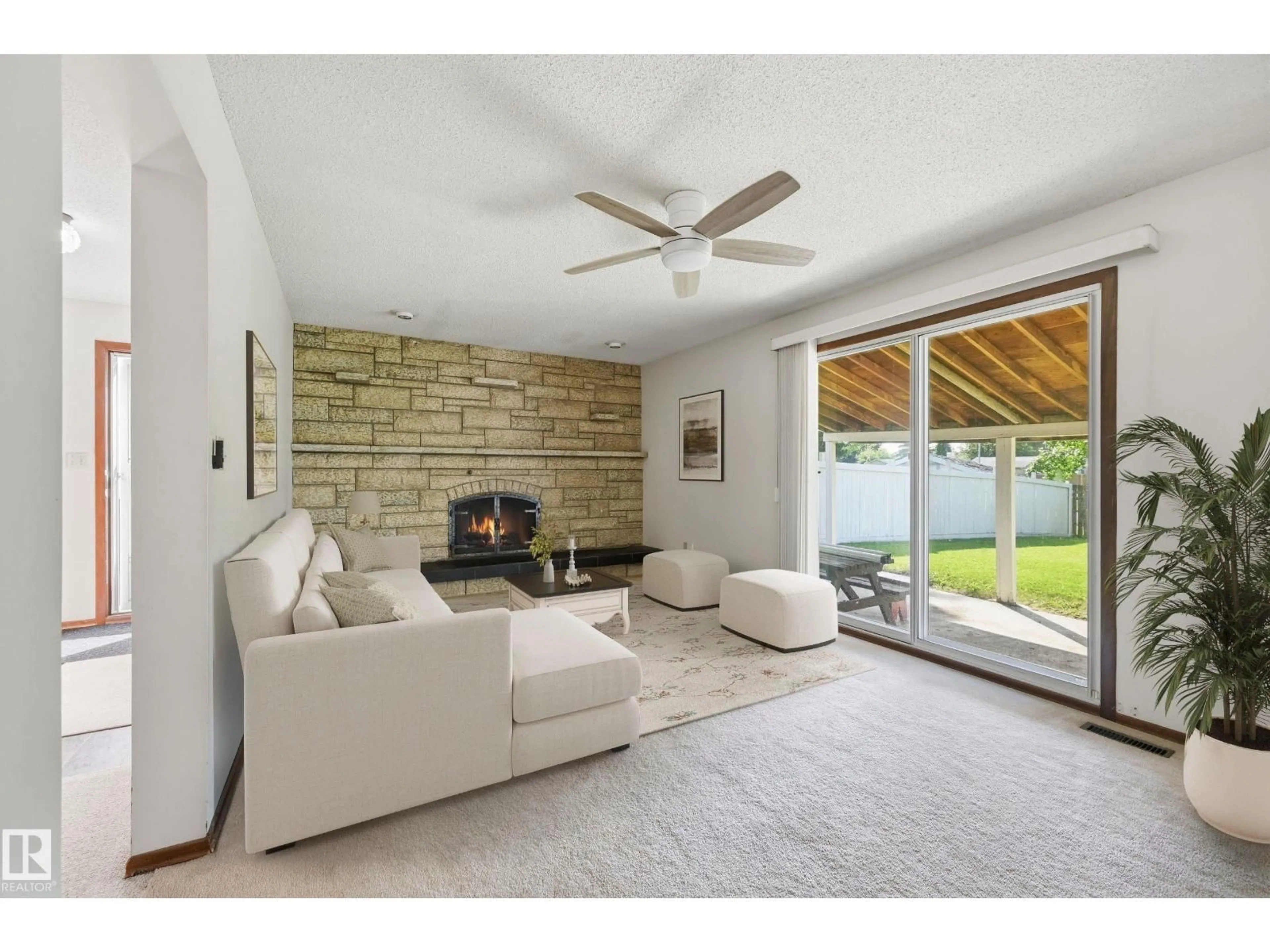 Living room with furniture, unknown for 8119 24 AV, Edmonton Alberta T6K2W2