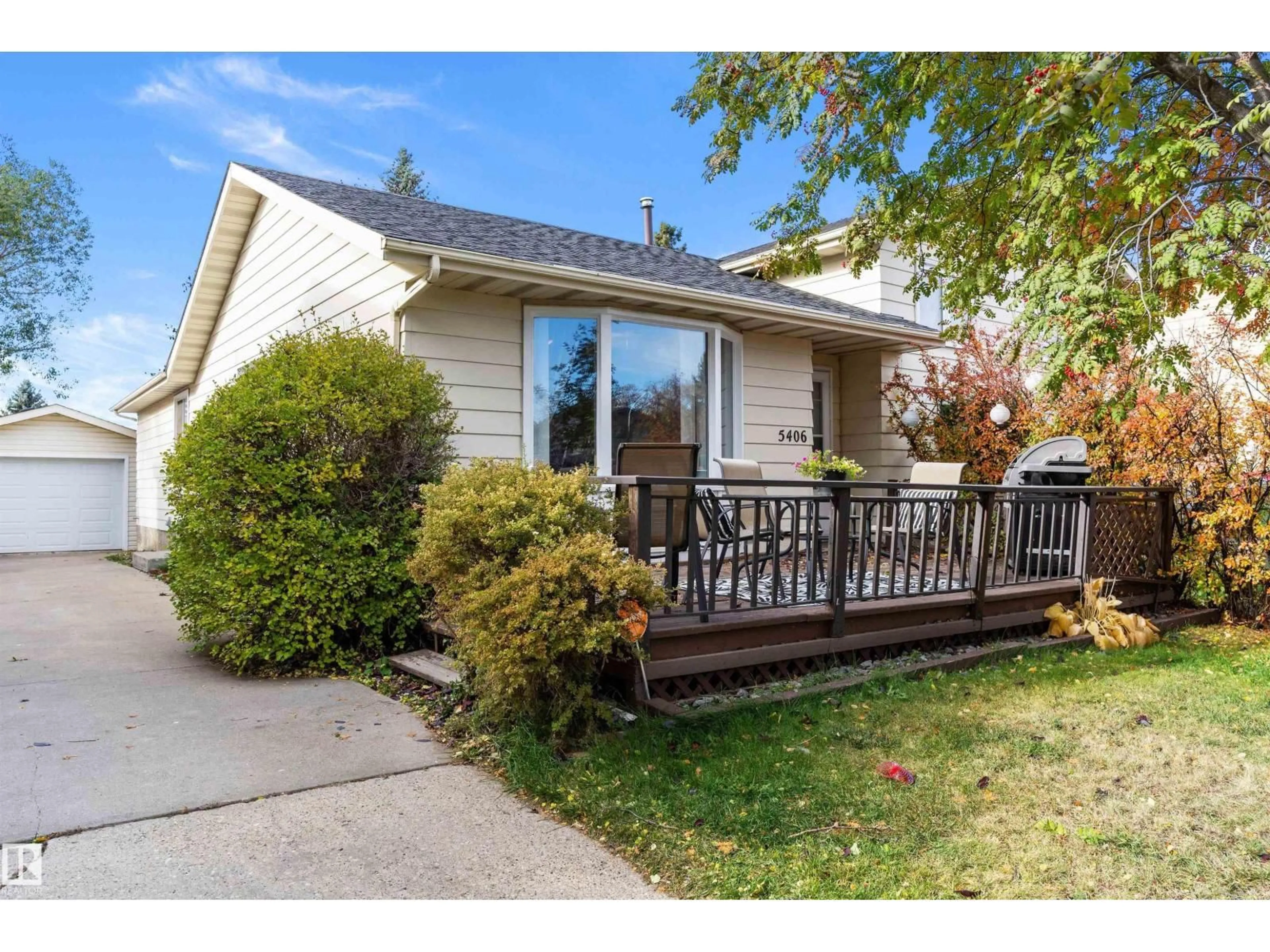 Home with vinyl exterior material, street for 5406 55 ST, Beaumont Alberta T4X1A4