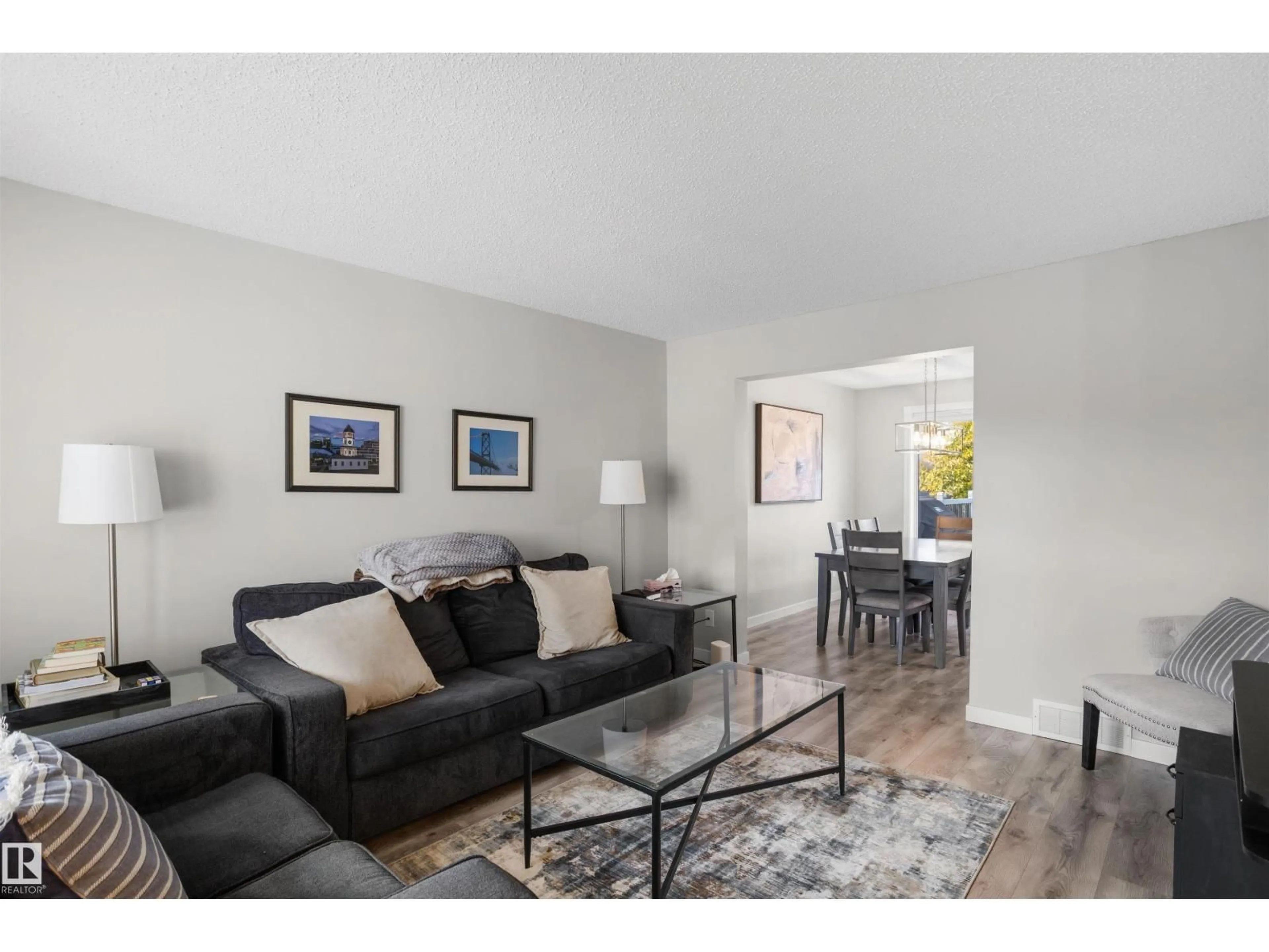 Living room with furniture, wood/laminate floor for 9 DAVY CR, Sherwood Park Alberta T8H1P4