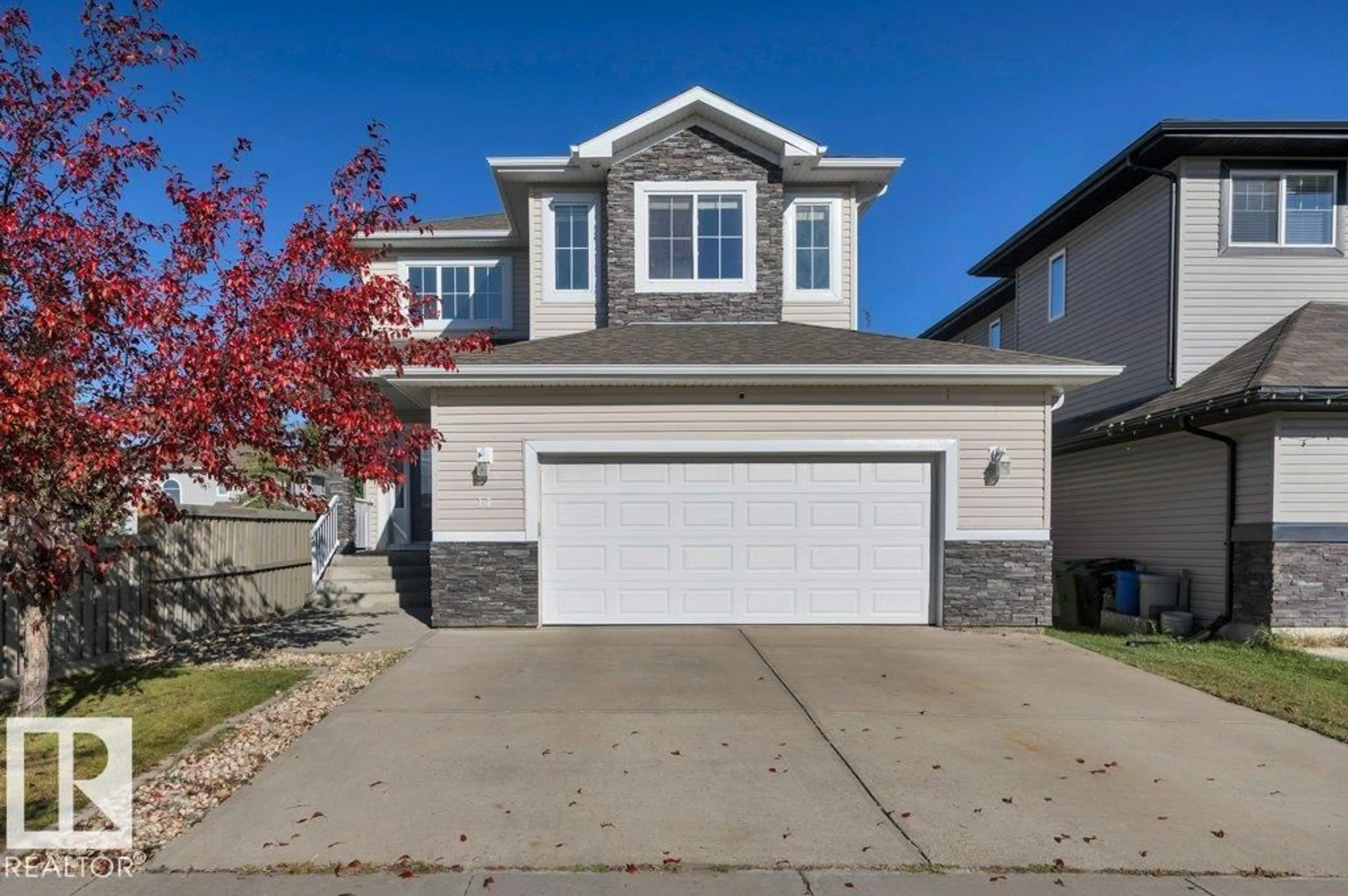 Home with vinyl exterior material, street for 14 SIENNA GA, Fort Saskatchewan Alberta T8L0J6