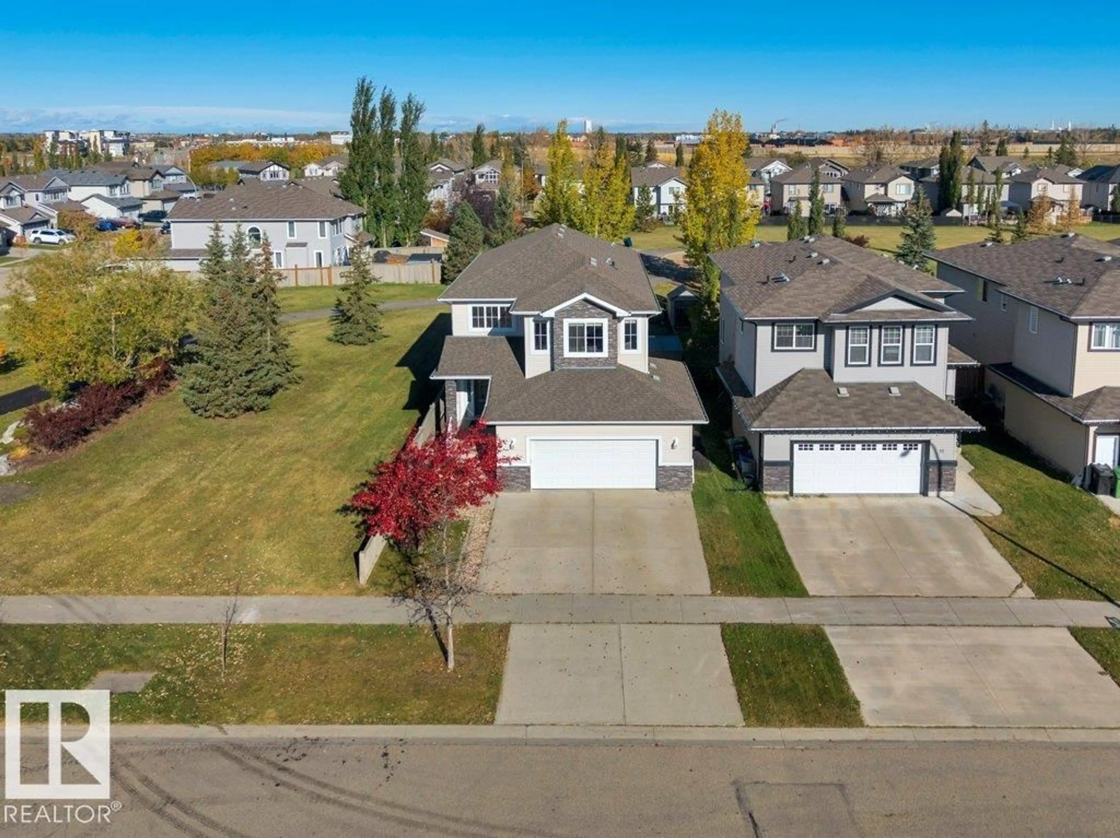 A pic from outside/outdoor area/front of a property/back of a property/a pic from drone, street for 14 SIENNA GA, Fort Saskatchewan Alberta T8L0J6