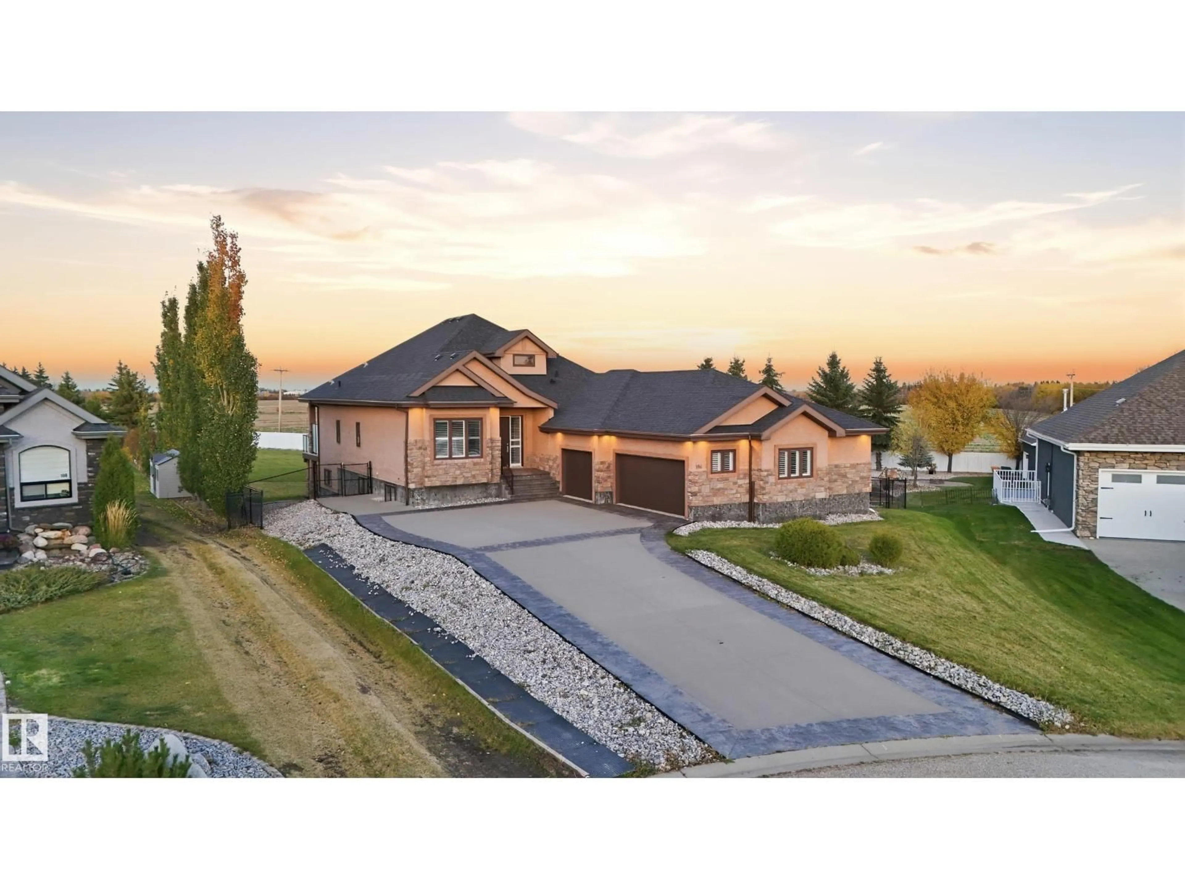 A pic from outside/outdoor area/front of a property/back of a property/a pic from drone, mountain view for 106 TUSCANO CLOSE, Rural Sturgeon County Alberta T8T0C9
