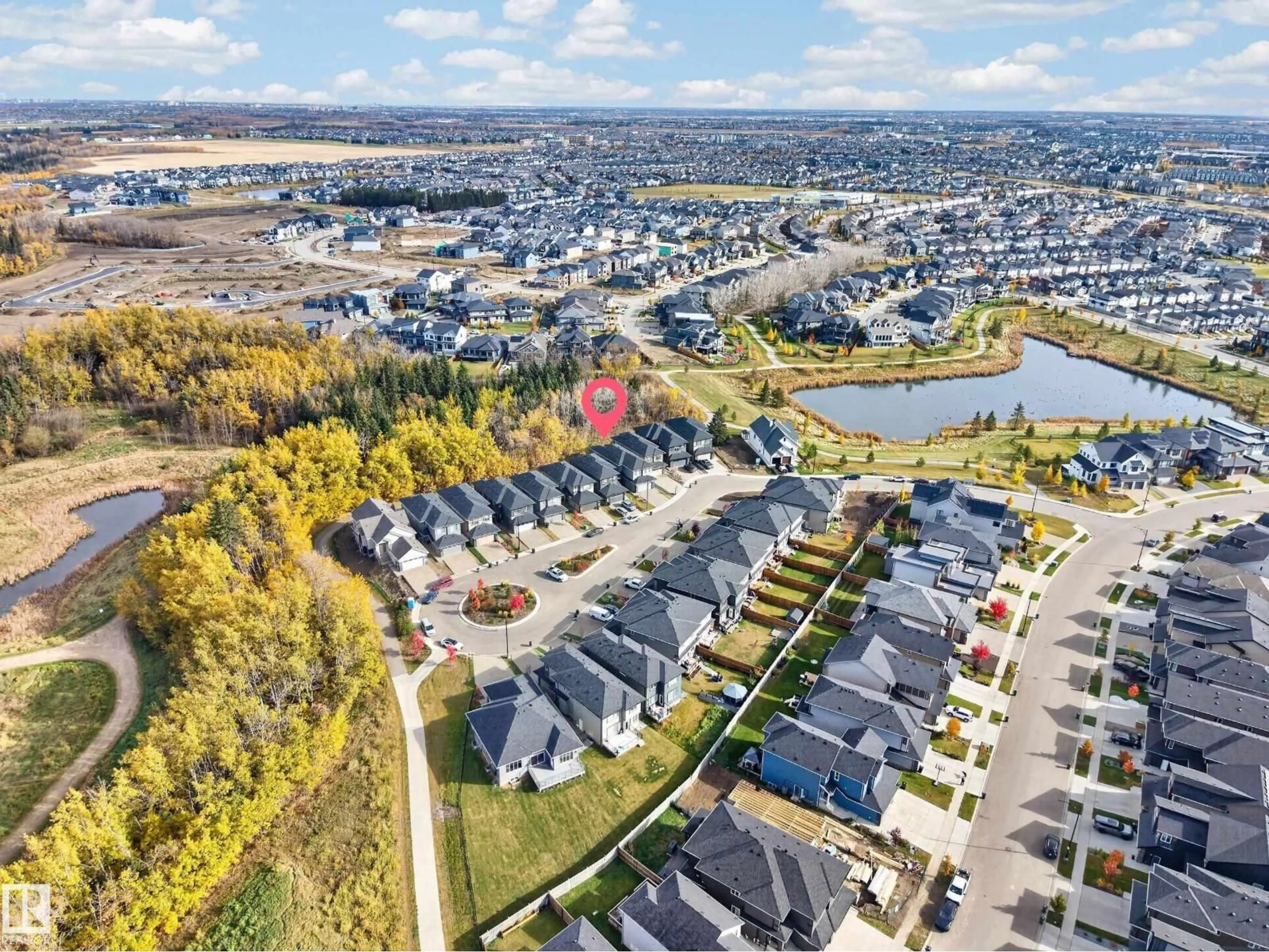 A pic from outside/outdoor area/front of a property/back of a property/a pic from drone, water/lake/river/ocean view for 6626 CRAWFORD LANDING SW, Edmonton Alberta T6W4L5