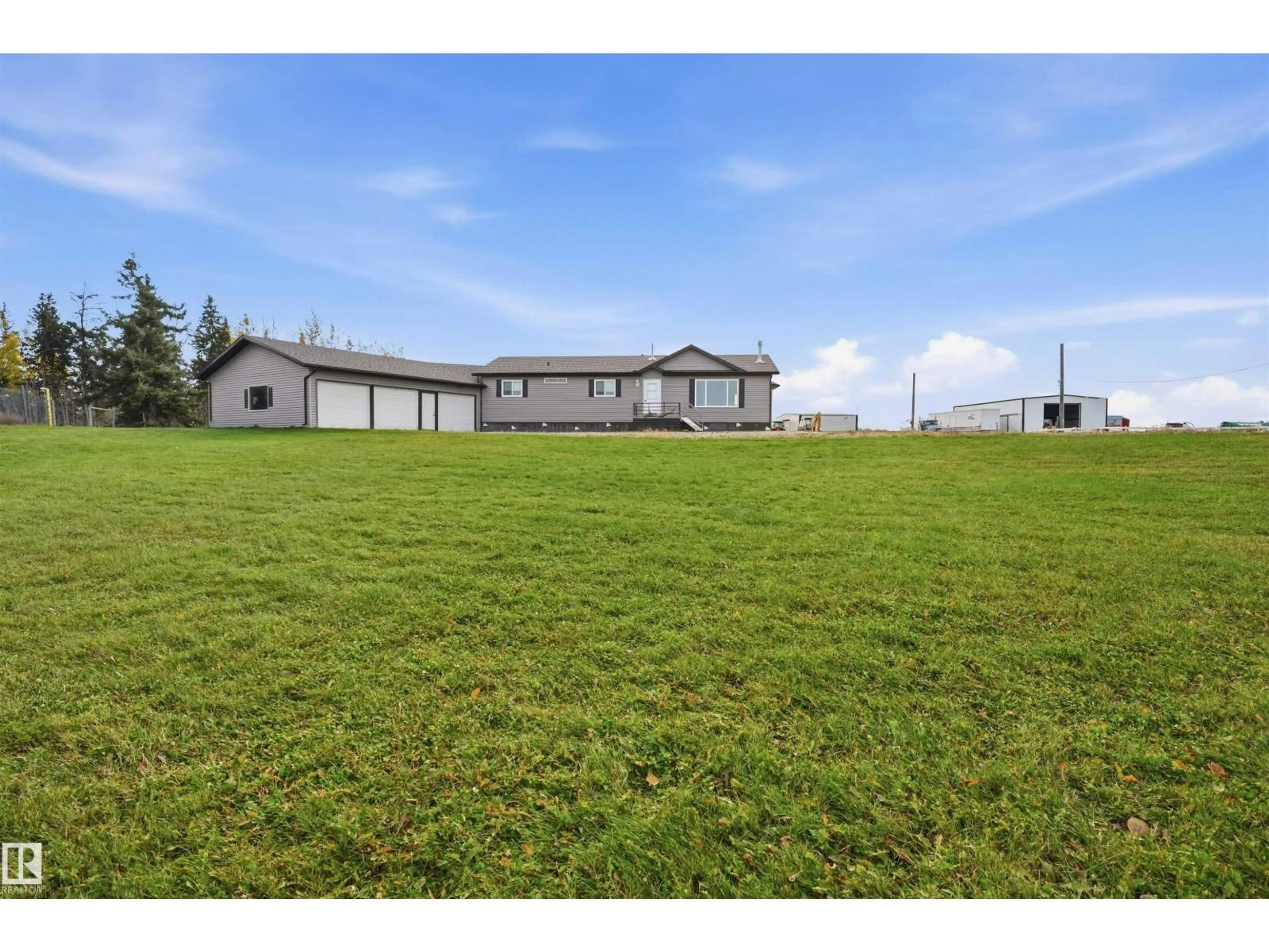A pic from outside/outdoor area/front of a property/back of a property/a pic from drone, water/lake/river/ocean view for 2309 TWP ROAD 545, Rural Lac Ste. Anne County Alberta T0E1V0