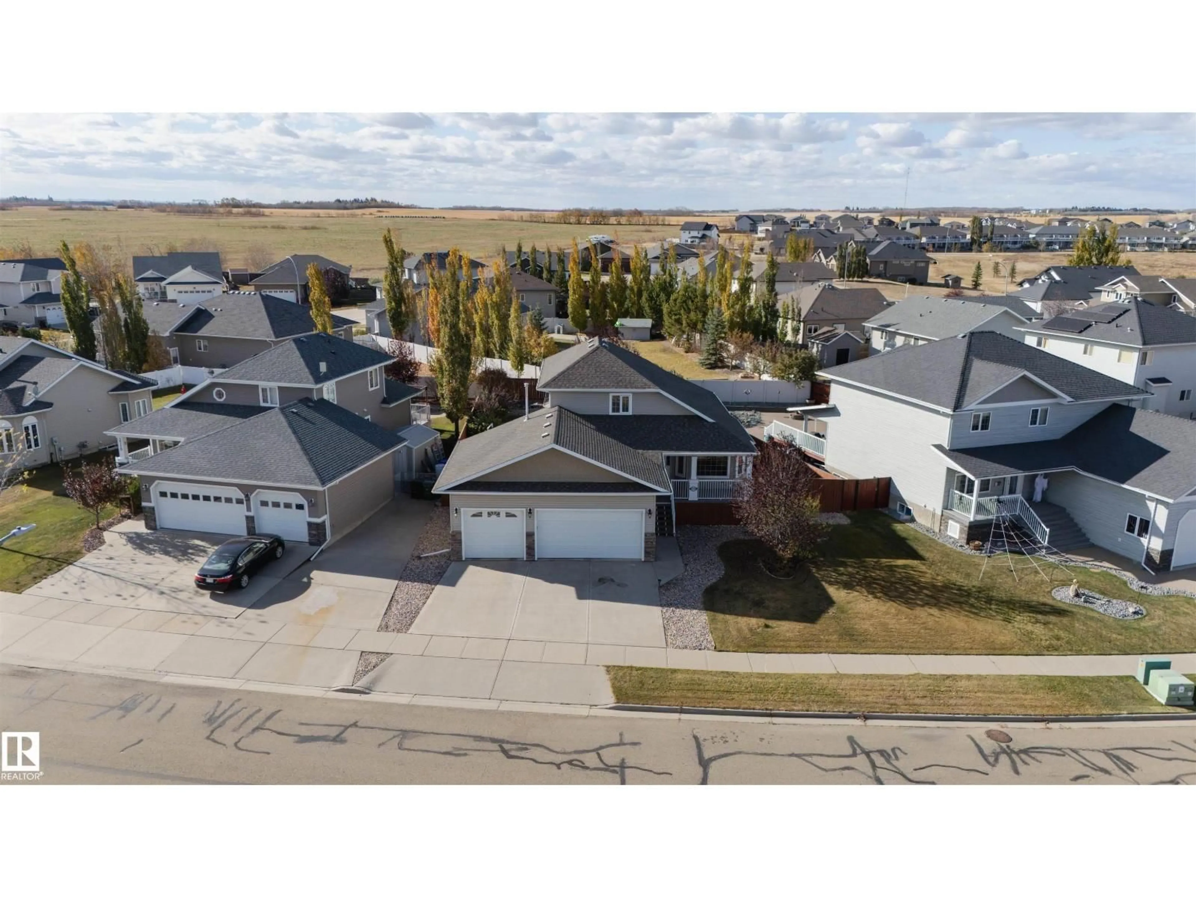 A pic from outside/outdoor area/front of a property/back of a property/a pic from drone, street for 3712 69 ST, Camrose Alberta T4V5B7