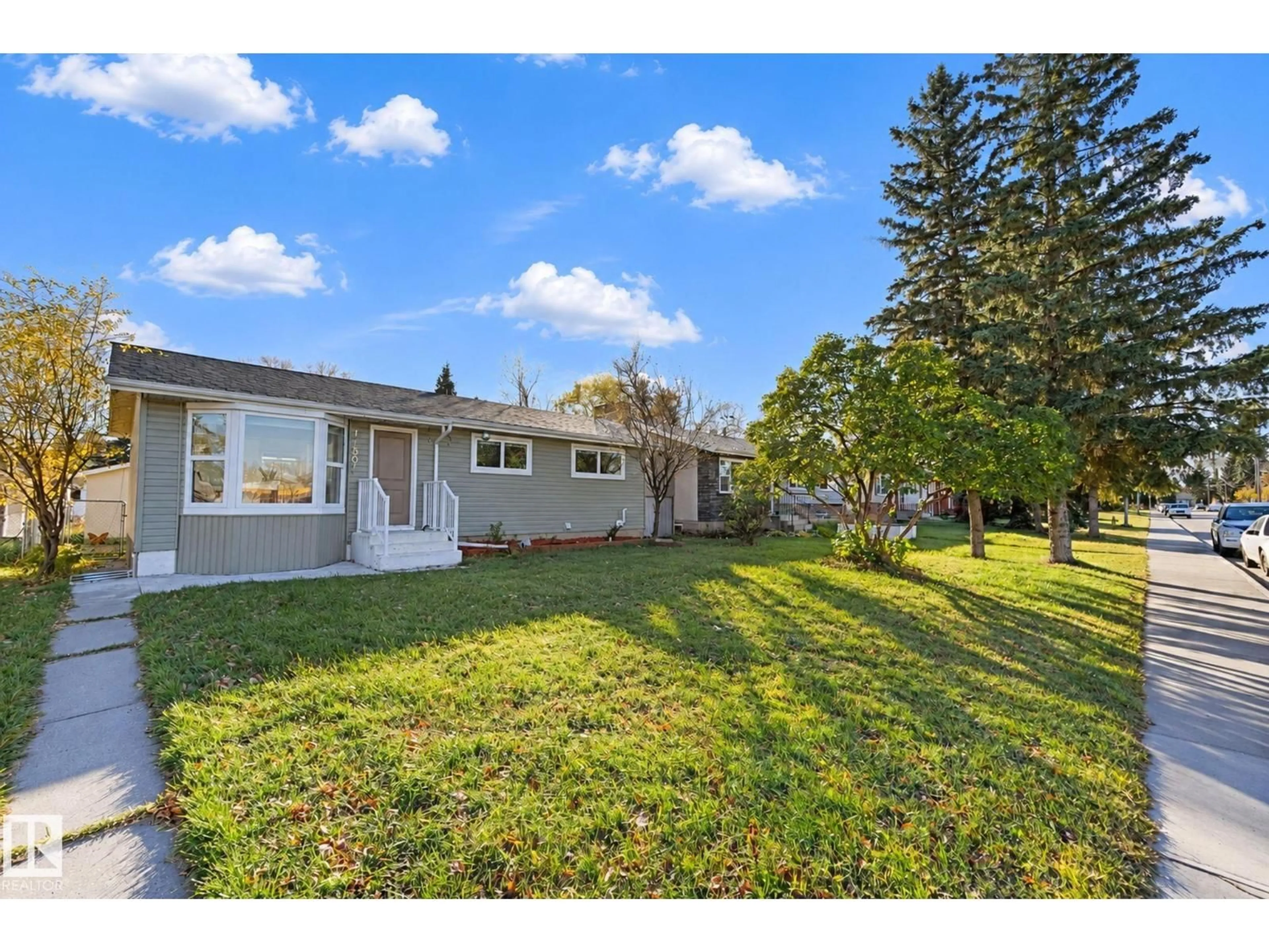 A pic from outside/outdoor area/front of a property/back of a property/a pic from drone, street for NW - 16507 91 AV, Edmonton Alberta T5R5A3