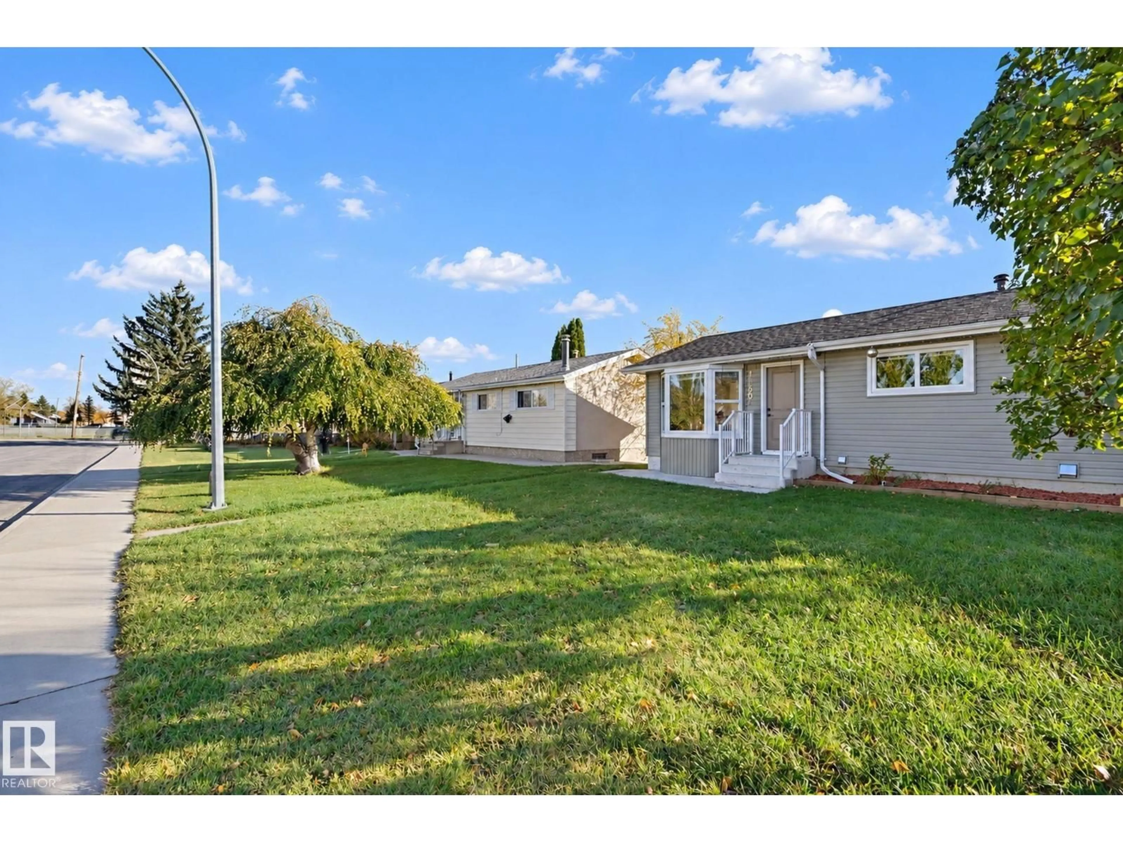 A pic from outside/outdoor area/front of a property/back of a property/a pic from drone, street for NW - 16507 91 AV, Edmonton Alberta T5R5A3