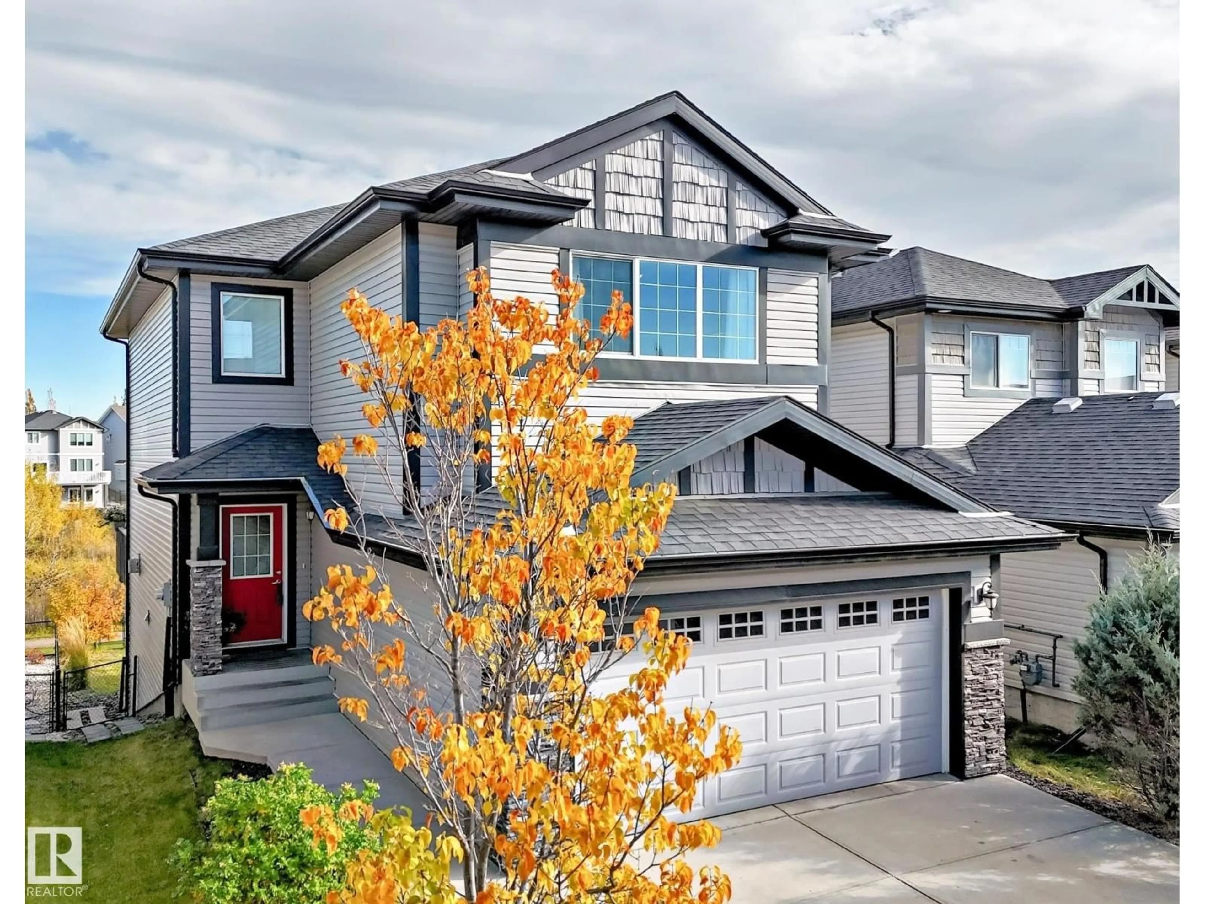 Home with vinyl exterior material, street for SW - 3819 AGAR GREEN GR, Edmonton Alberta T6W0W9