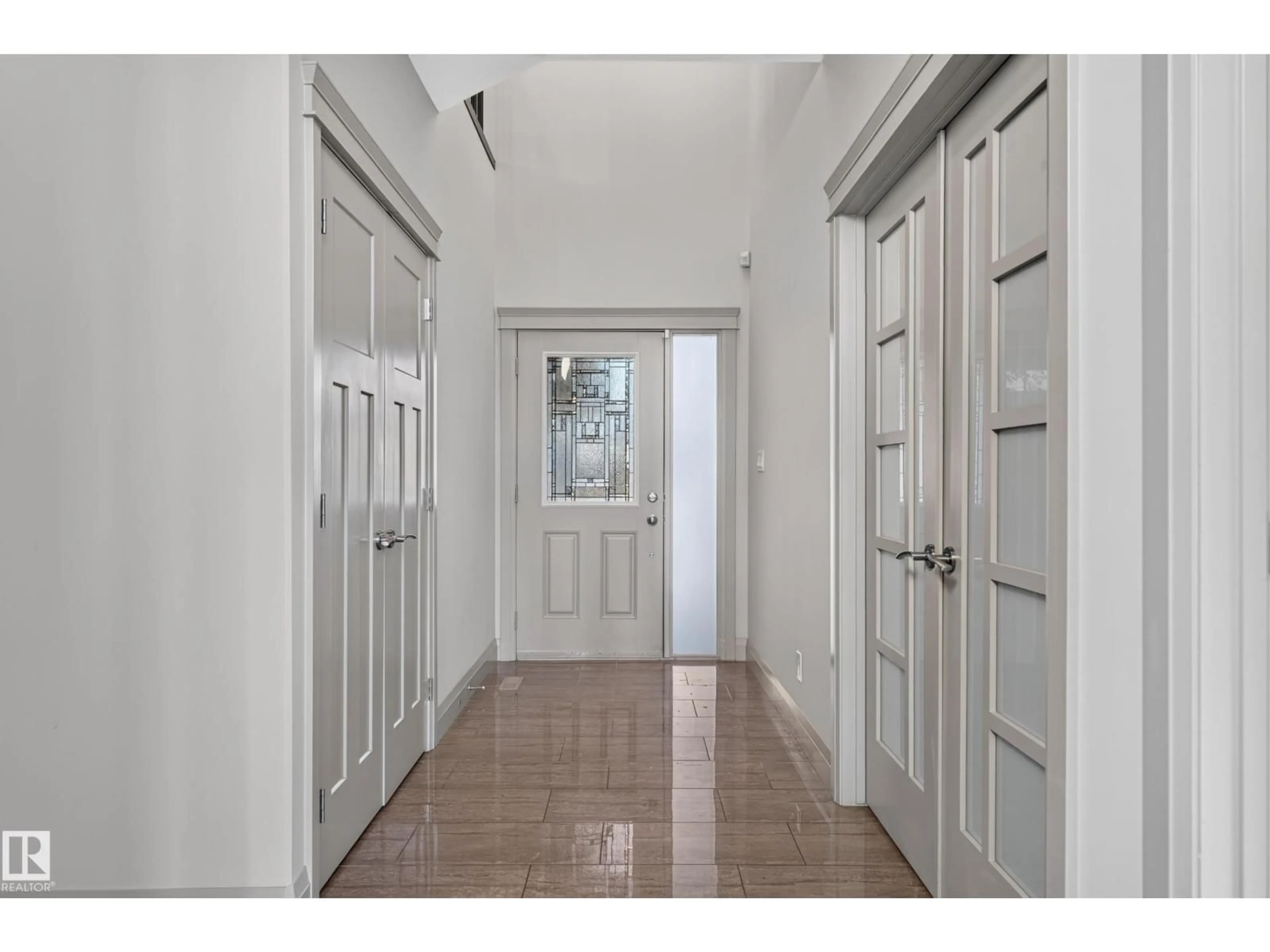 Indoor foyer for 2433 ASHCRAFT CR, Edmonton Alberta T6W2M9