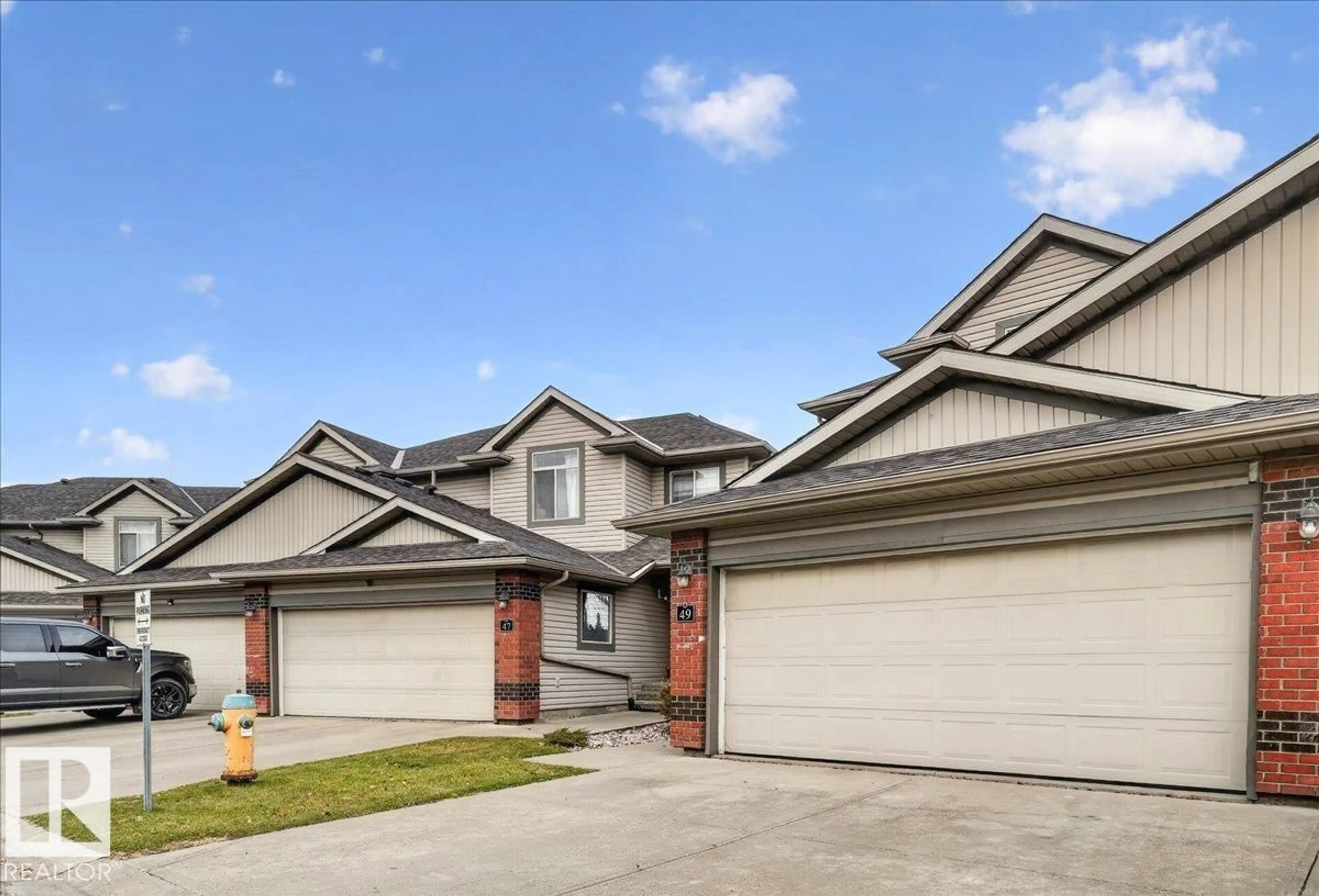 Home with brick exterior material, street for 49 - 1128 156 ST, Edmonton Alberta T6R0C9