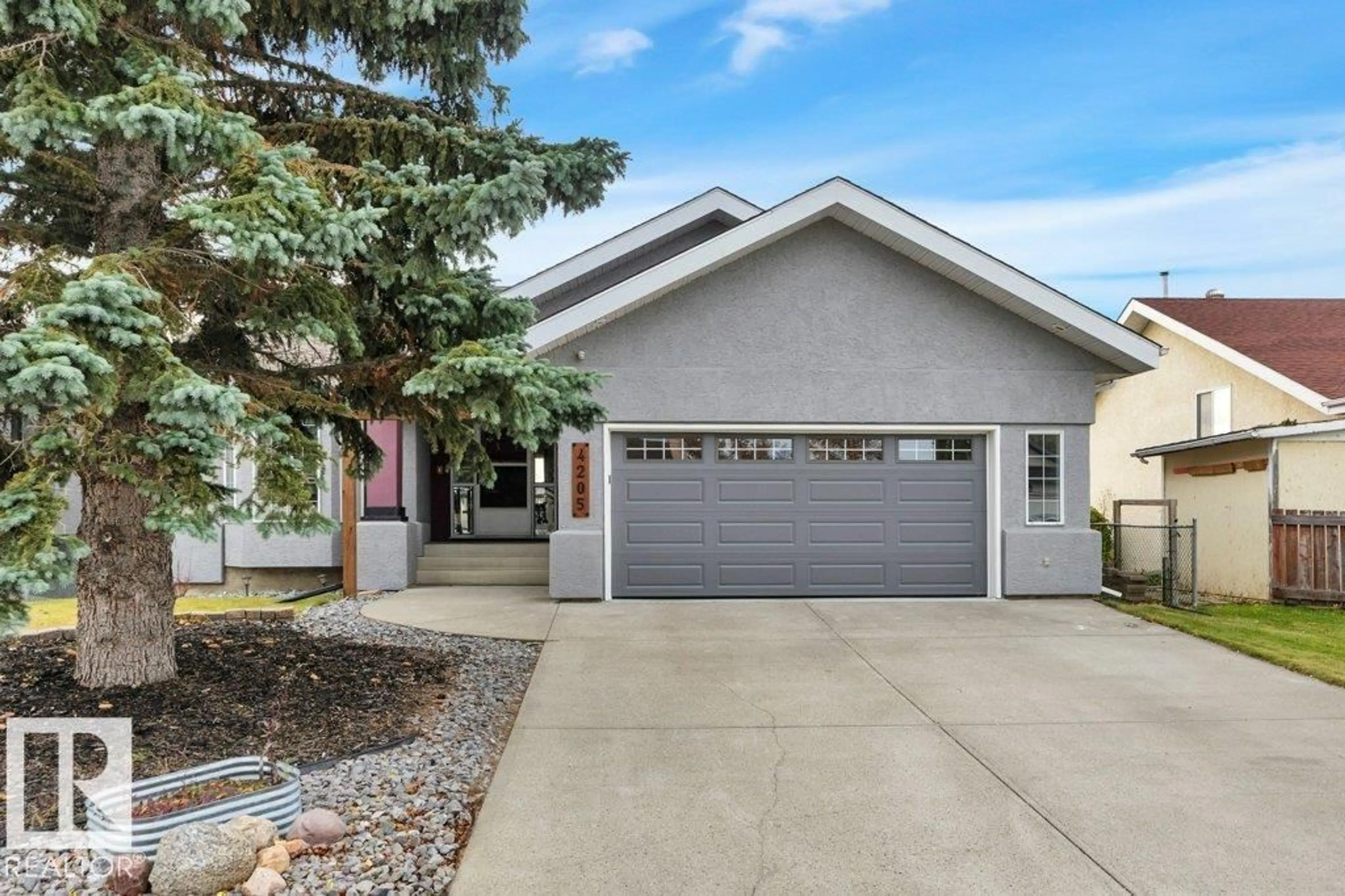 Home with vinyl exterior material, street for 4205 43 AV, Beaumont Alberta T4X1M5