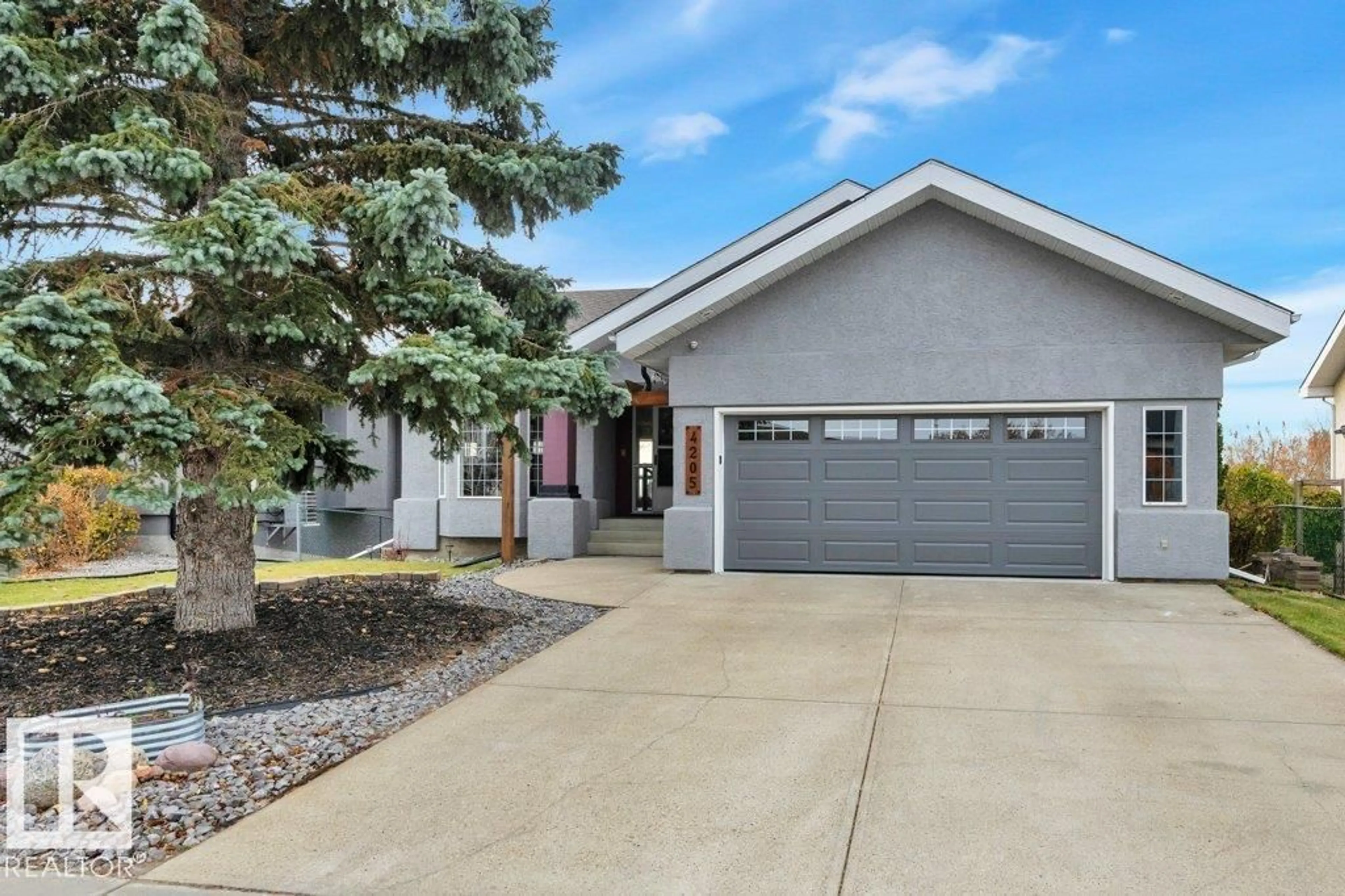 Home with vinyl exterior material, street for 4205 43 AV, Beaumont Alberta T4X1M5