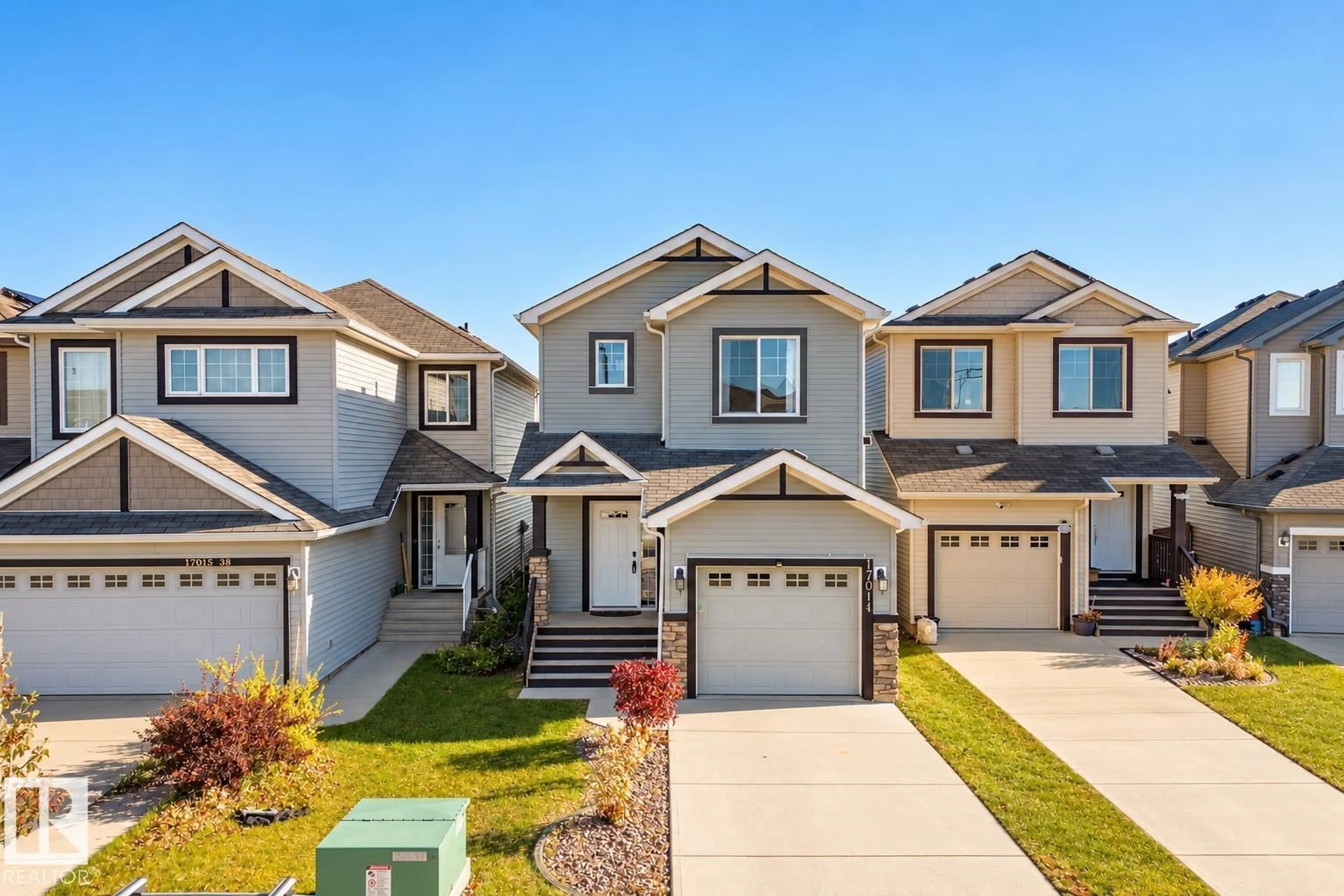 Home with vinyl exterior material, street for NW - 17011 38 ST, Edmonton Alberta T5Y3S2