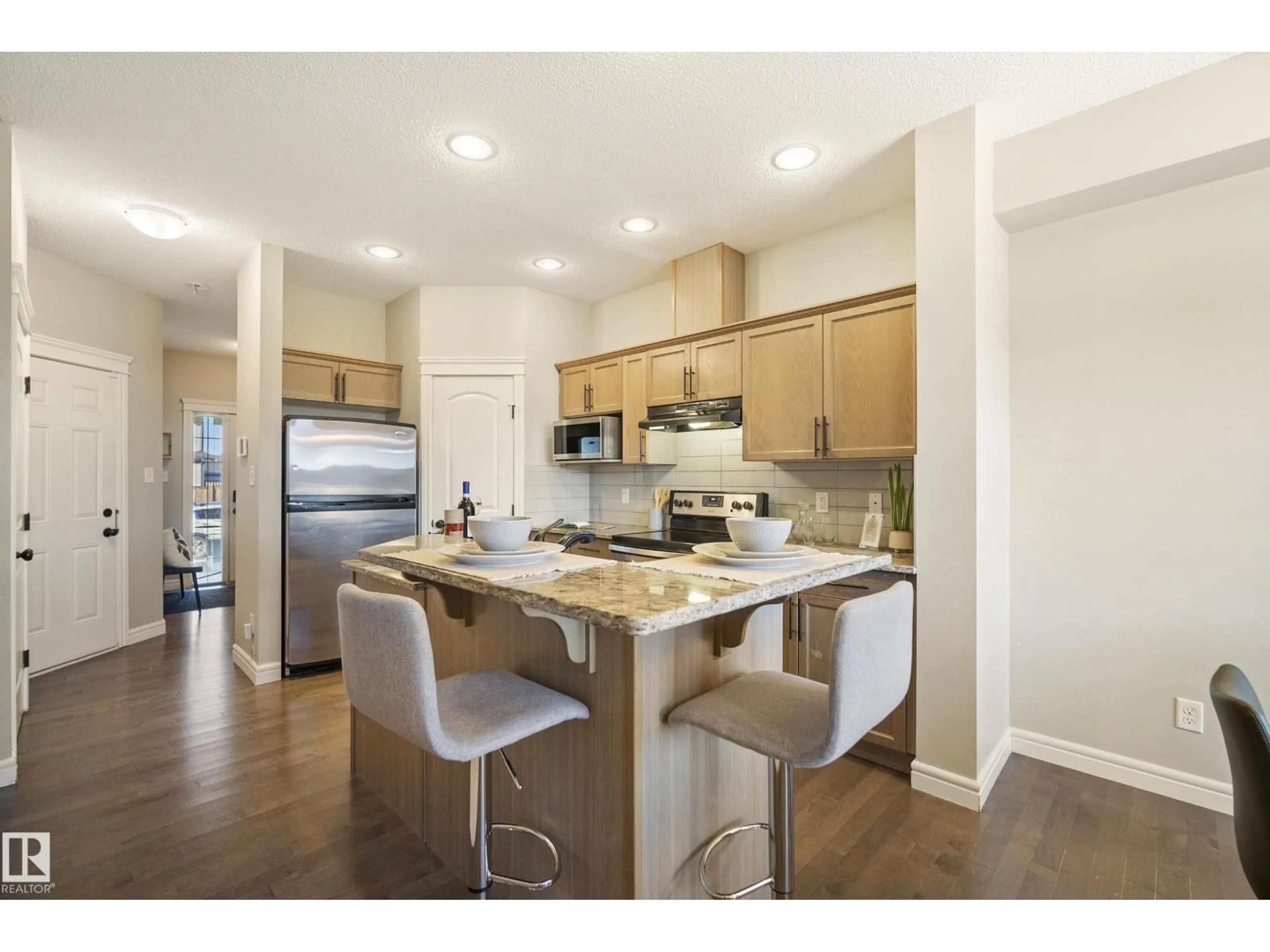 Open concept kitchen, unknown for NW - 17011 38 ST, Edmonton Alberta T5Y3S2
