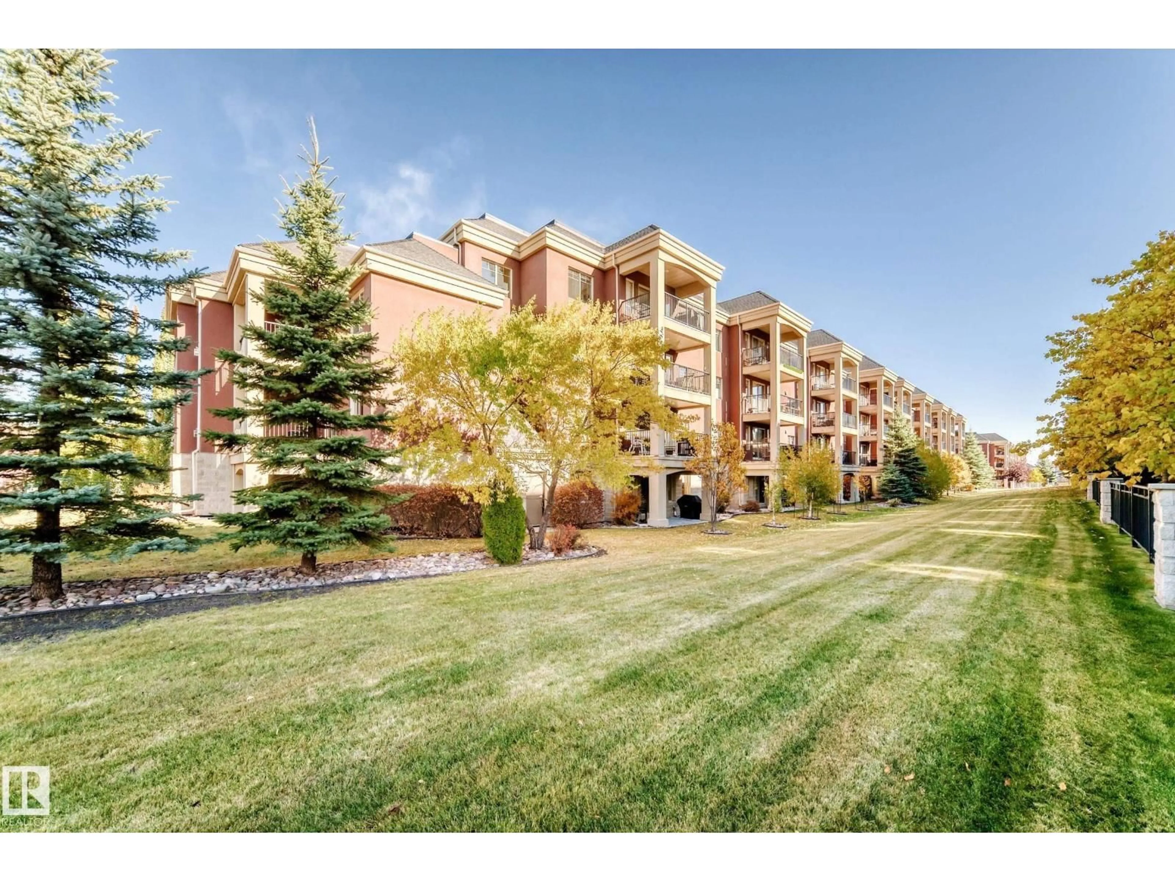 A pic from outside/outdoor area/front of a property/back of a property/a pic from drone, mountain view for 207 - 500 PALISADES WY, Sherwood Park Alberta T8H0H7