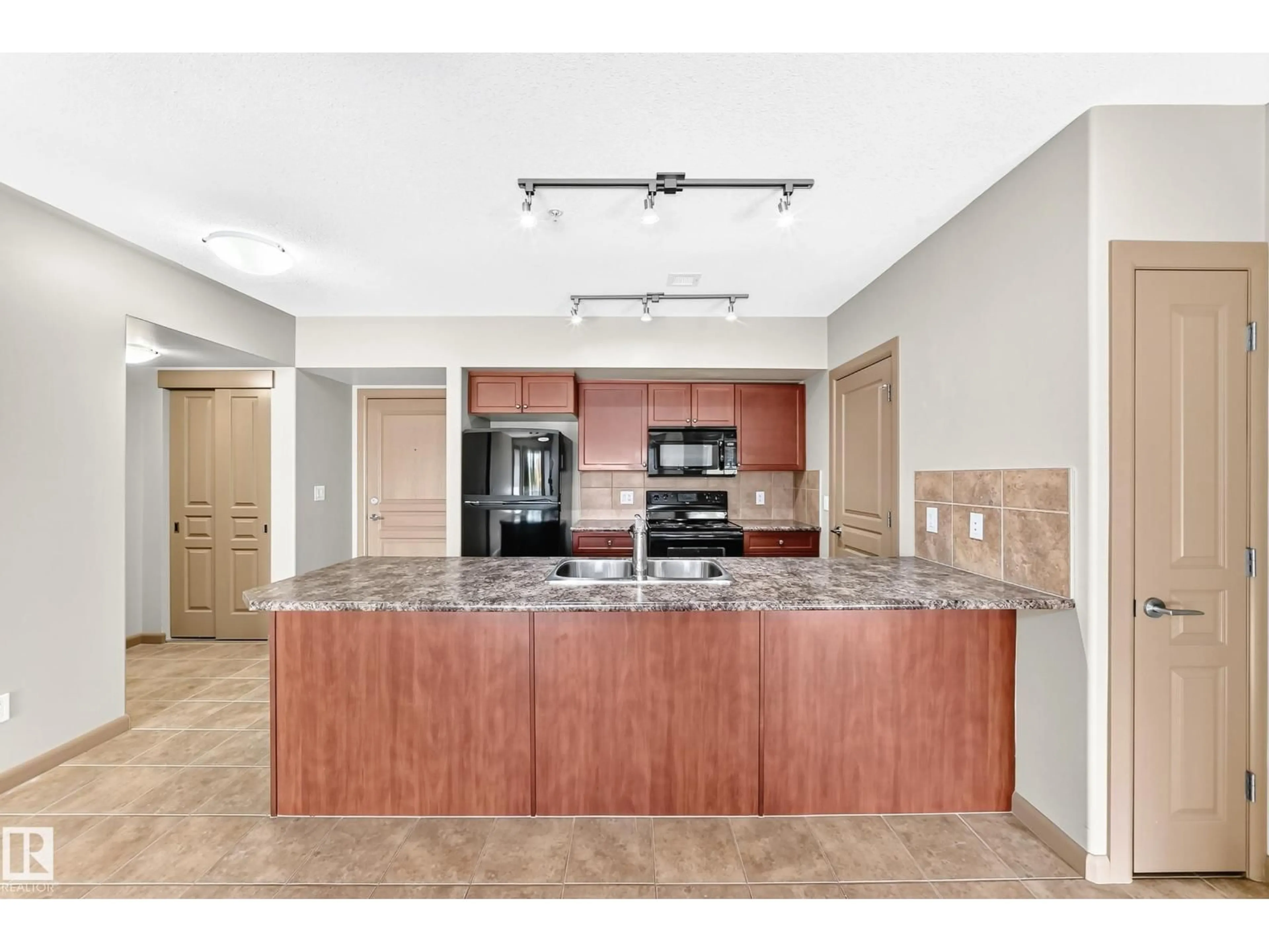 Open concept kitchen, ceramic/tile floor for 207 - 500 PALISADES WY, Sherwood Park Alberta T8H0H7