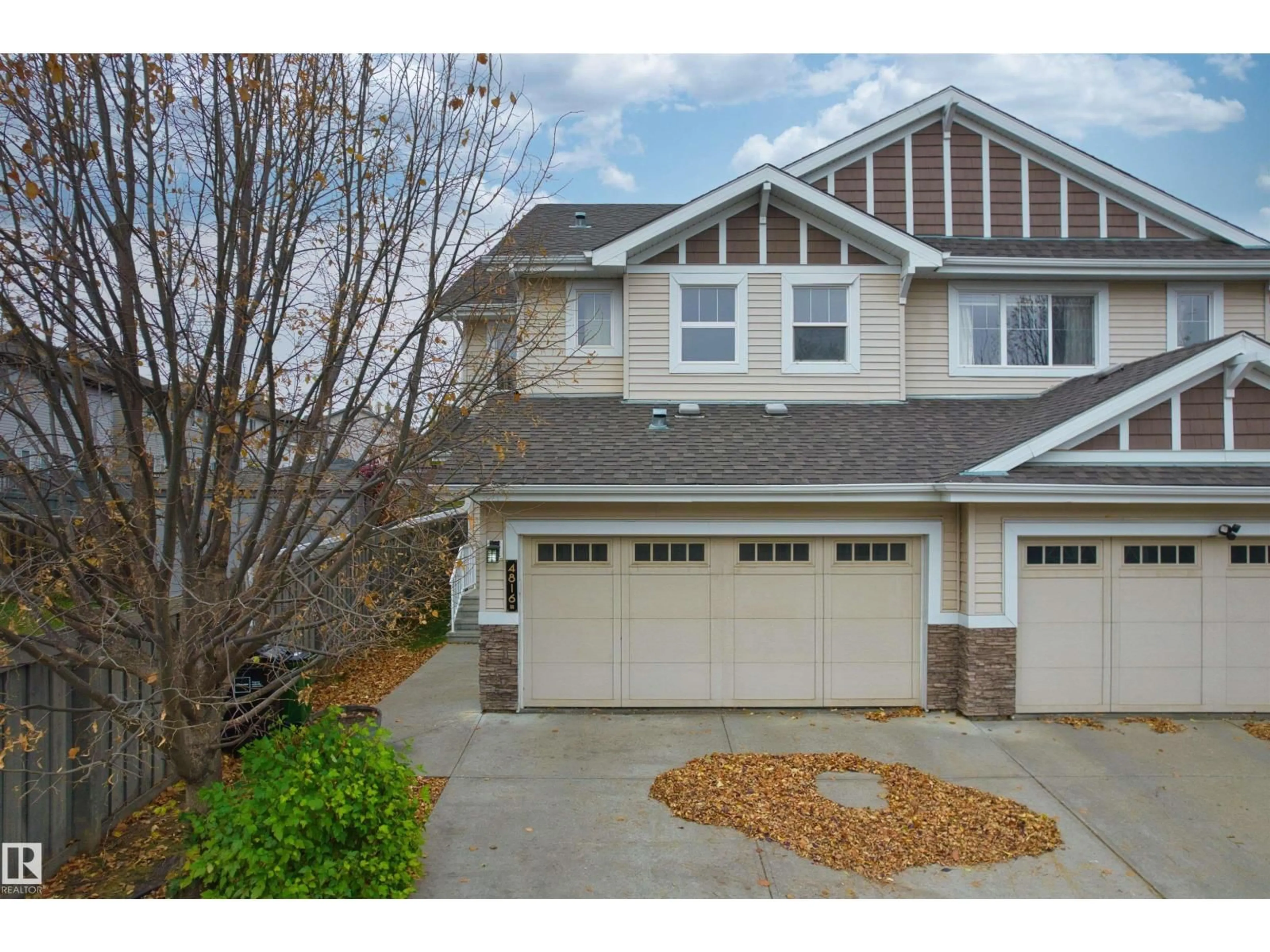 A pic from outside/outdoor area/front of a property/back of a property/a pic from drone, street for NW - 4816 213 ST, Edmonton Alberta T6M0G7