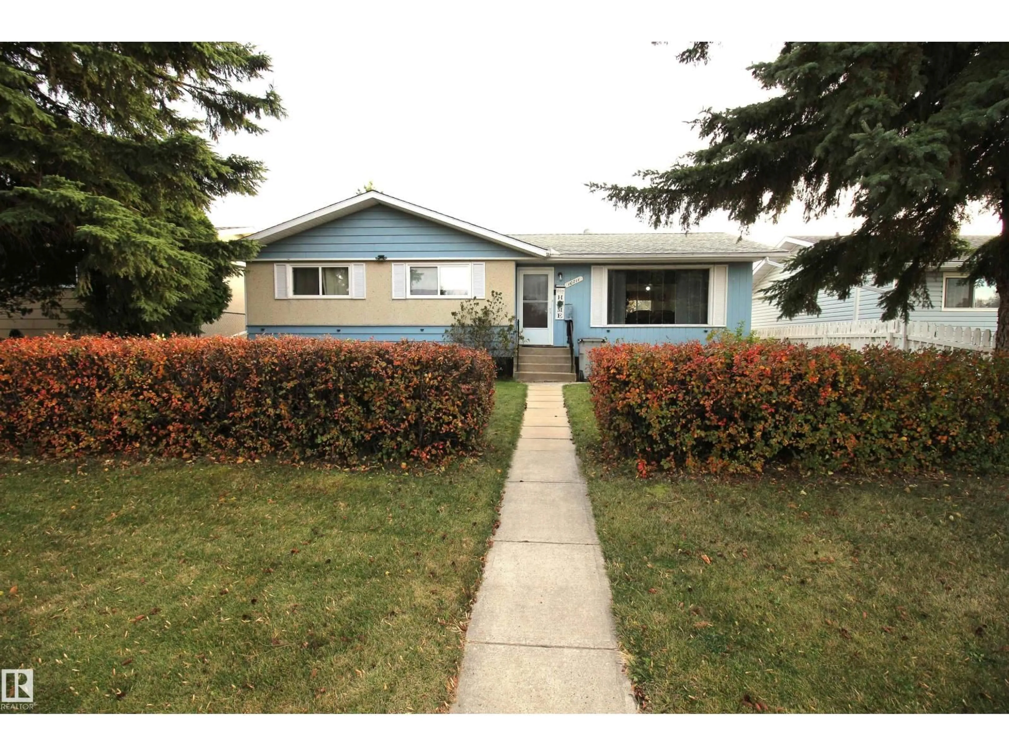Home with vinyl exterior material, street for 10711 102 ST, Westlock Alberta T7P1H6