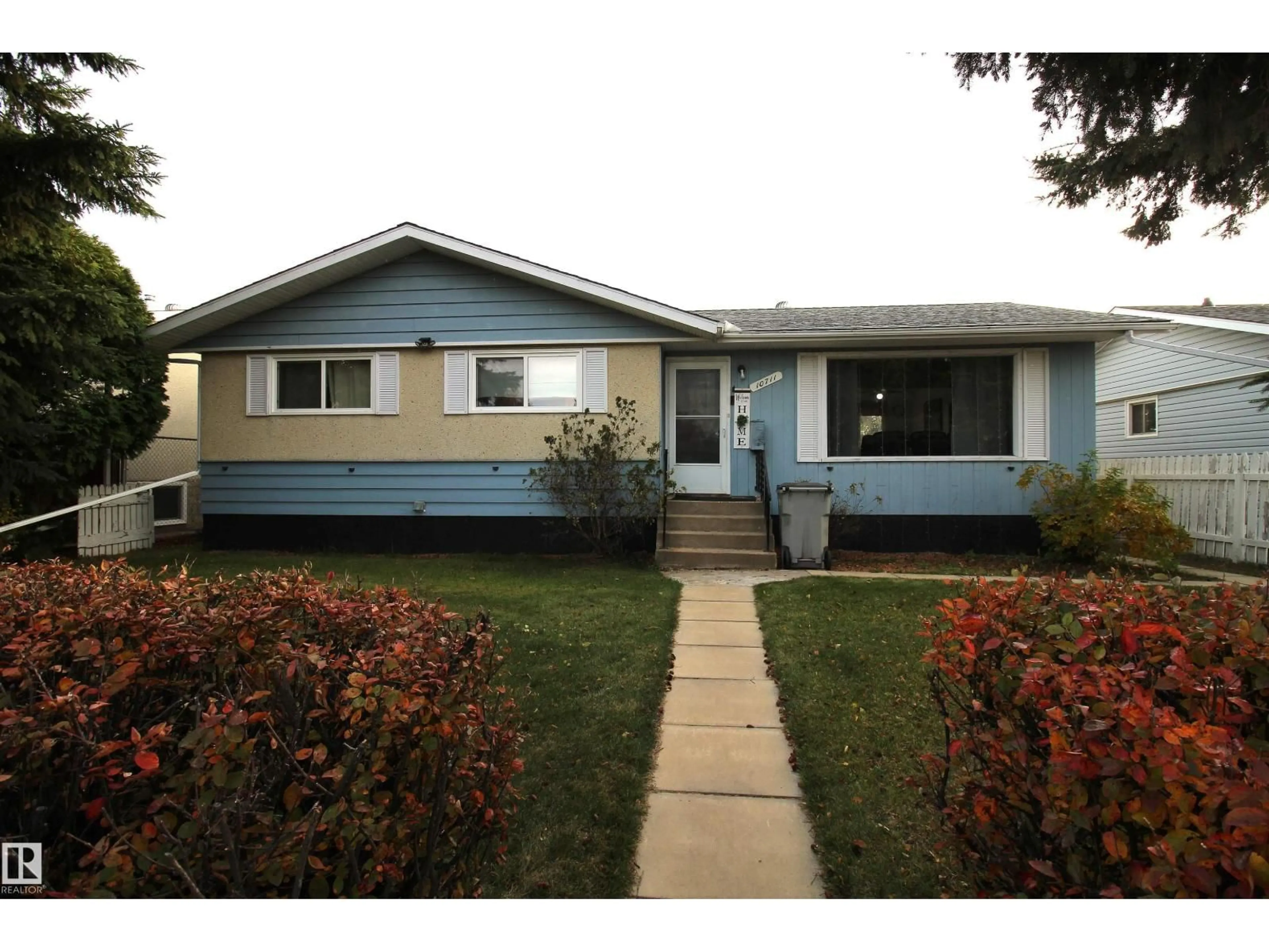 Home with vinyl exterior material, street for 10711 102 ST, Westlock Alberta T7P1H6