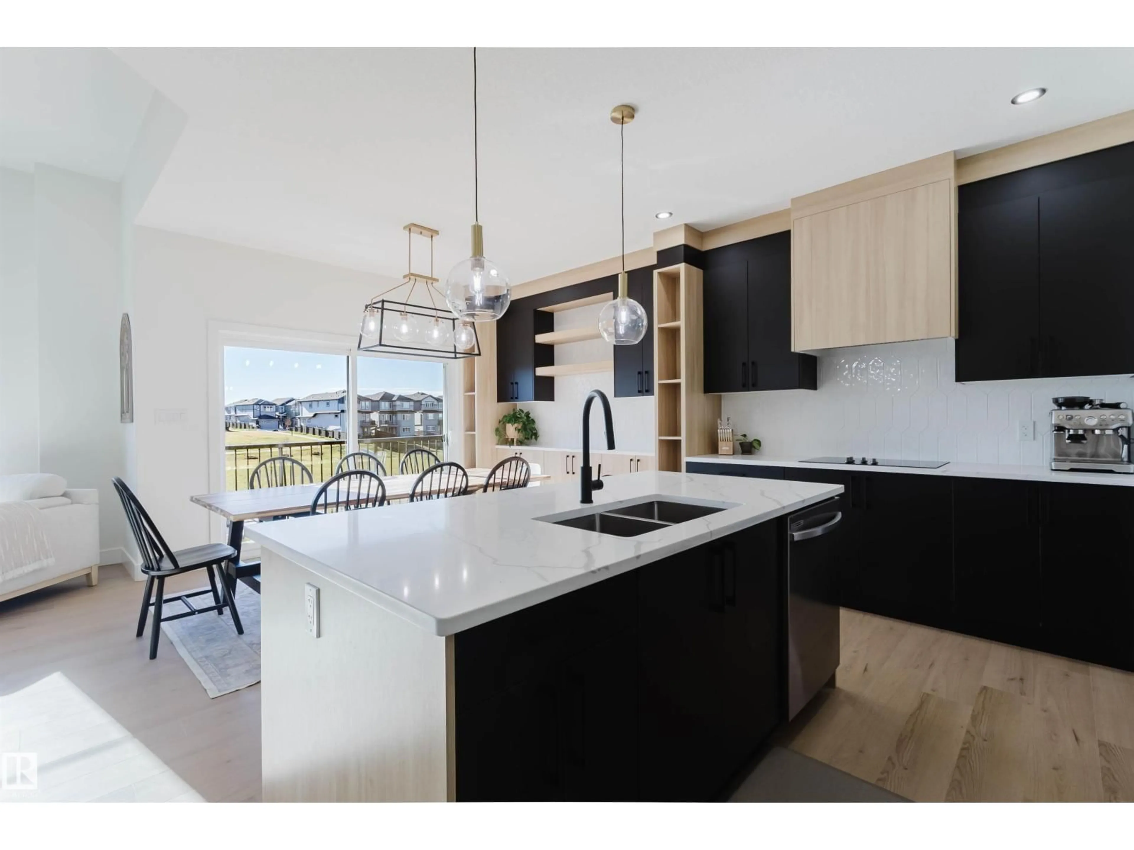 Open concept kitchen, ceramic/tile floor for 8519 183 AVE, Edmonton Alberta T5Z0X5