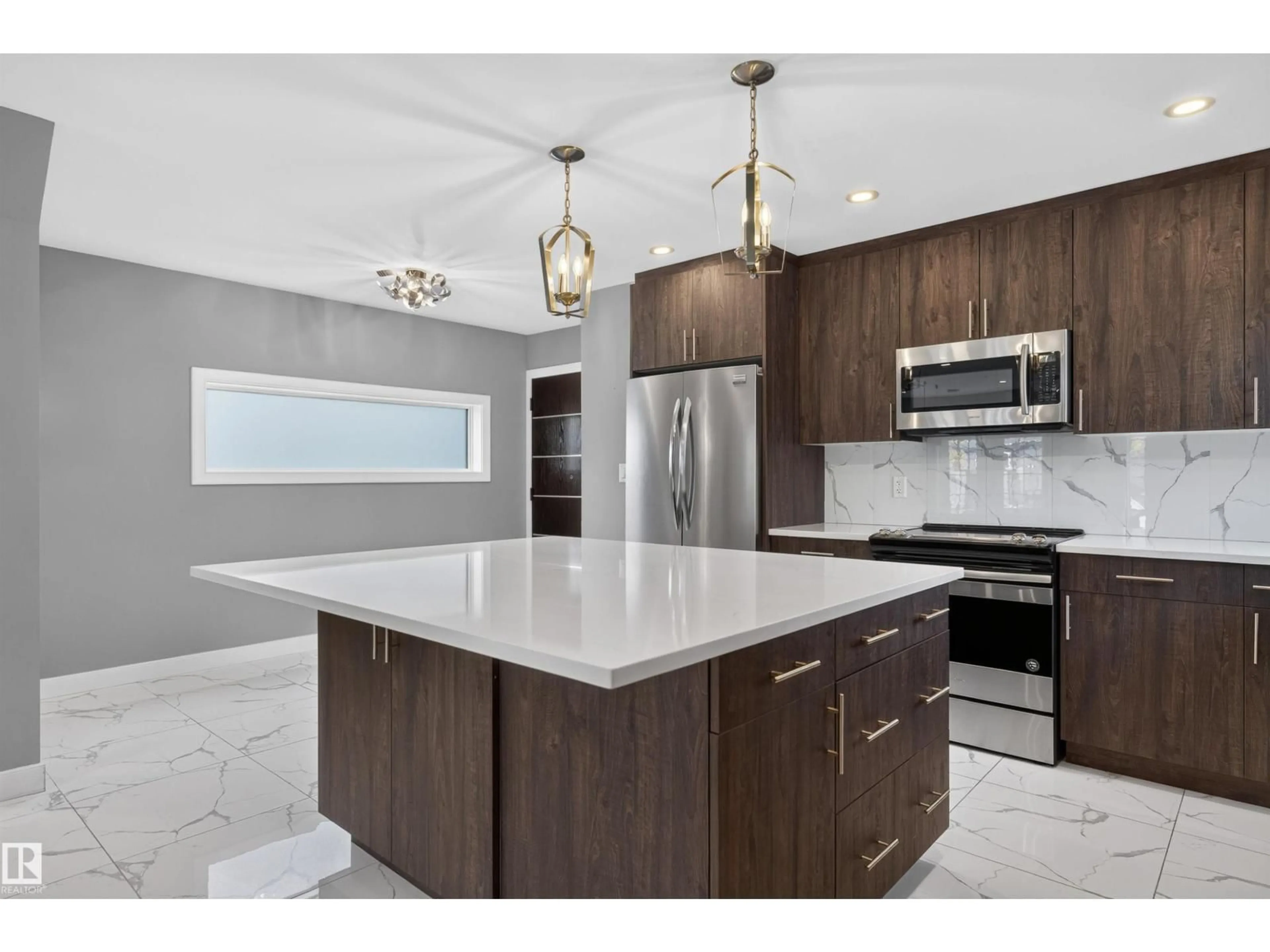 Open concept kitchen, ceramic/tile floor for 9526 109A AV, Edmonton Alberta T5H1G3