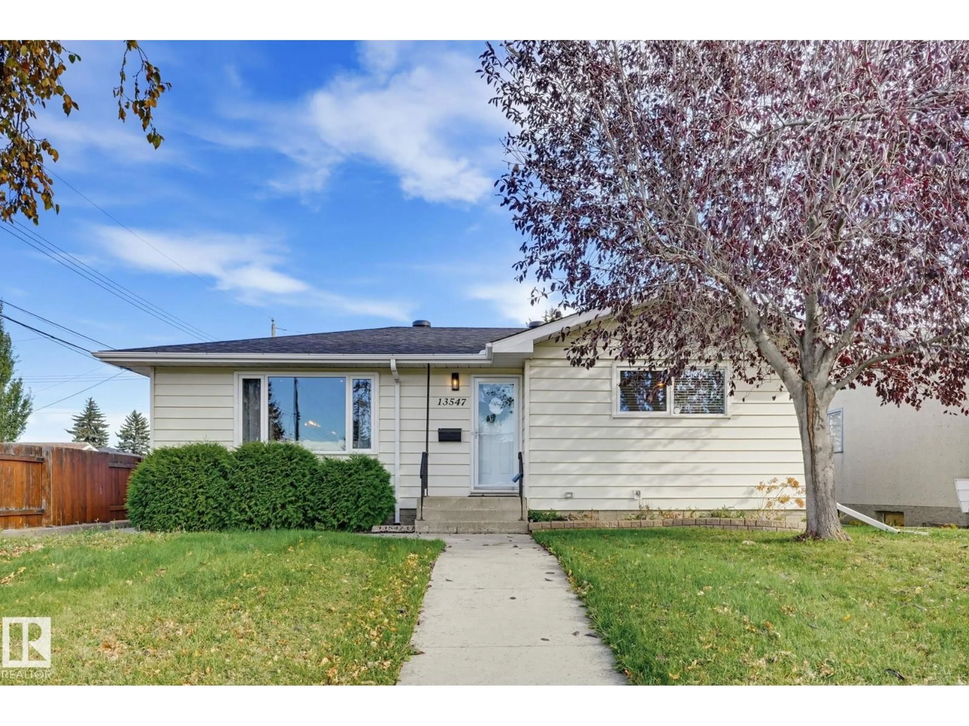 Home with vinyl exterior material, street for NW - 13547 90 ST, Edmonton Alberta T5E3M9
