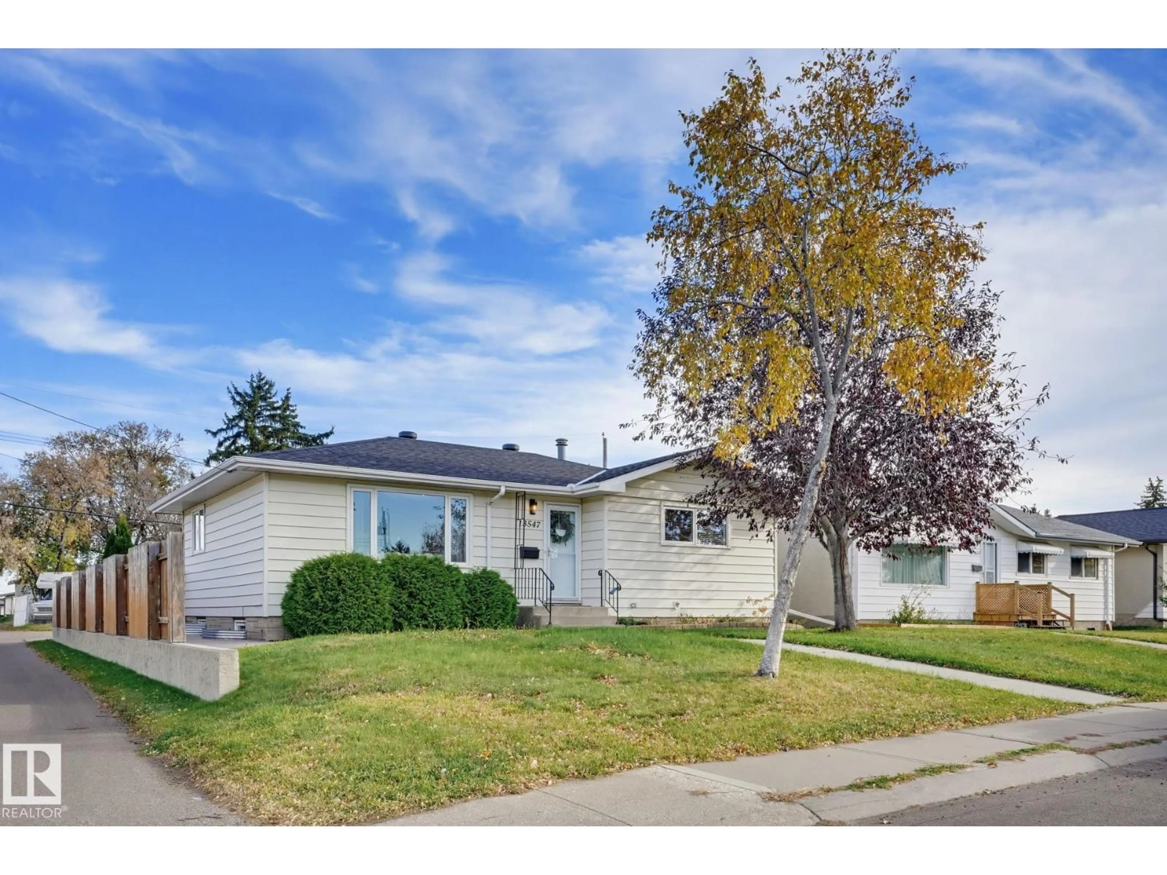 Home with vinyl exterior material, street for NW - 13547 90 ST, Edmonton Alberta T5E3M9