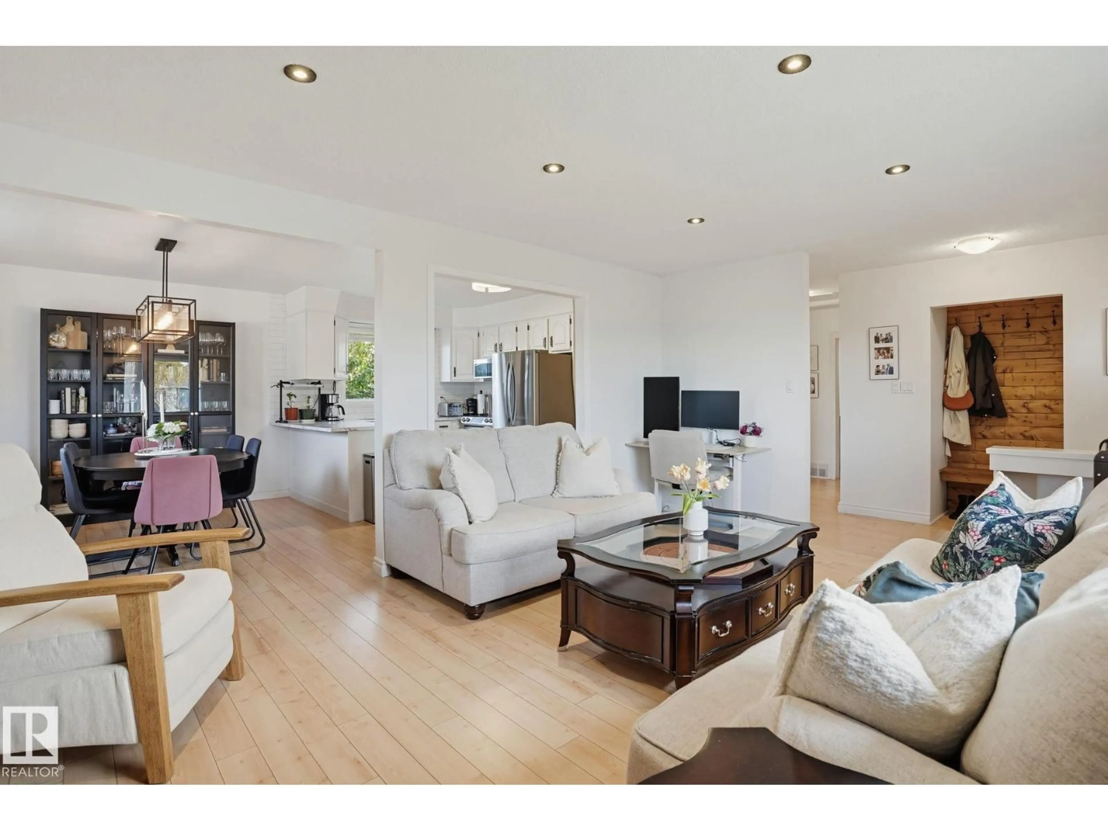 Living room with furniture, wood/laminate floor for NW - 13547 90 ST, Edmonton Alberta T5E3M9