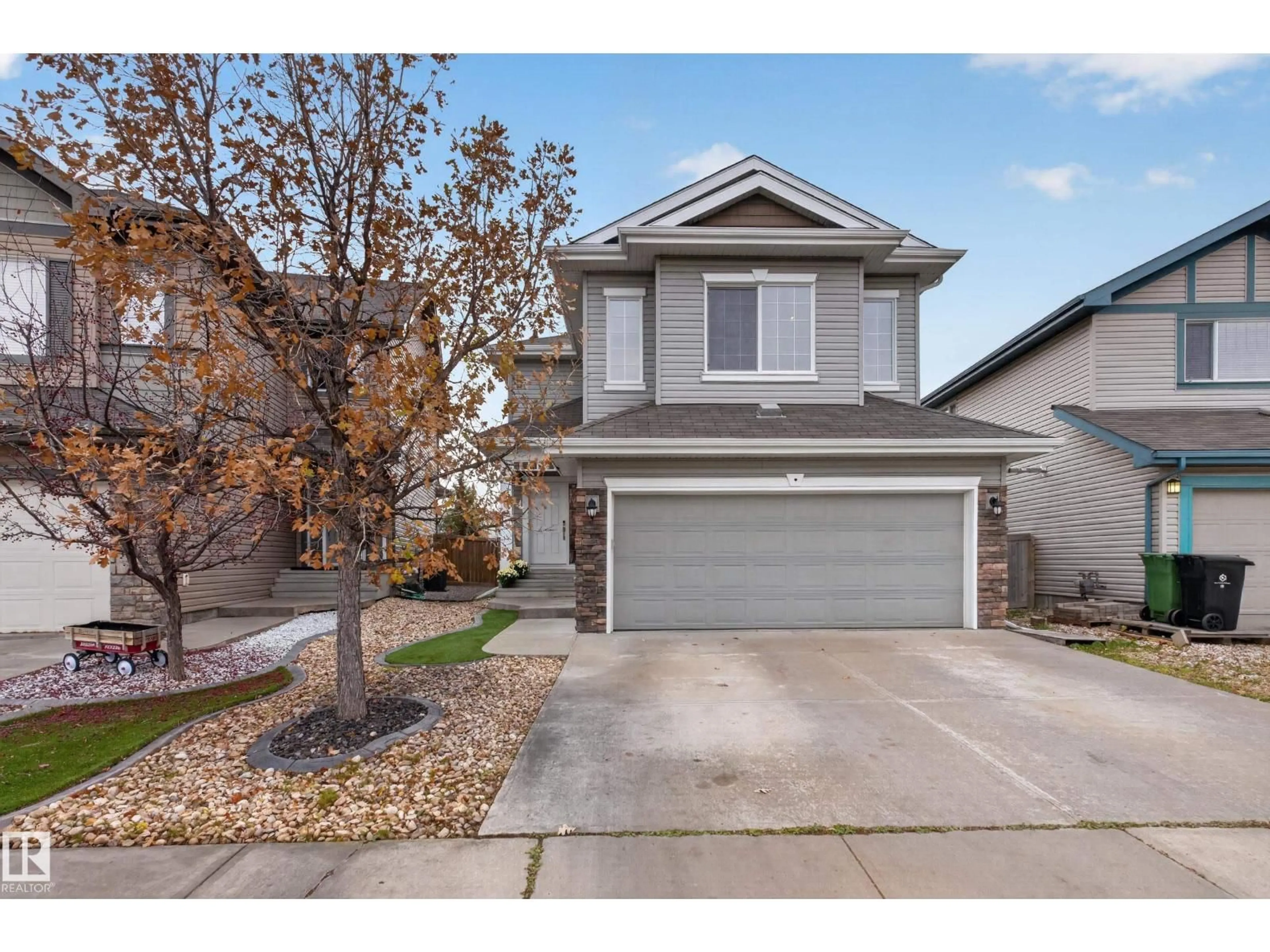 Home with vinyl exterior material, street for 7 BREMNER, Fort Saskatchewan Alberta T8L0E2