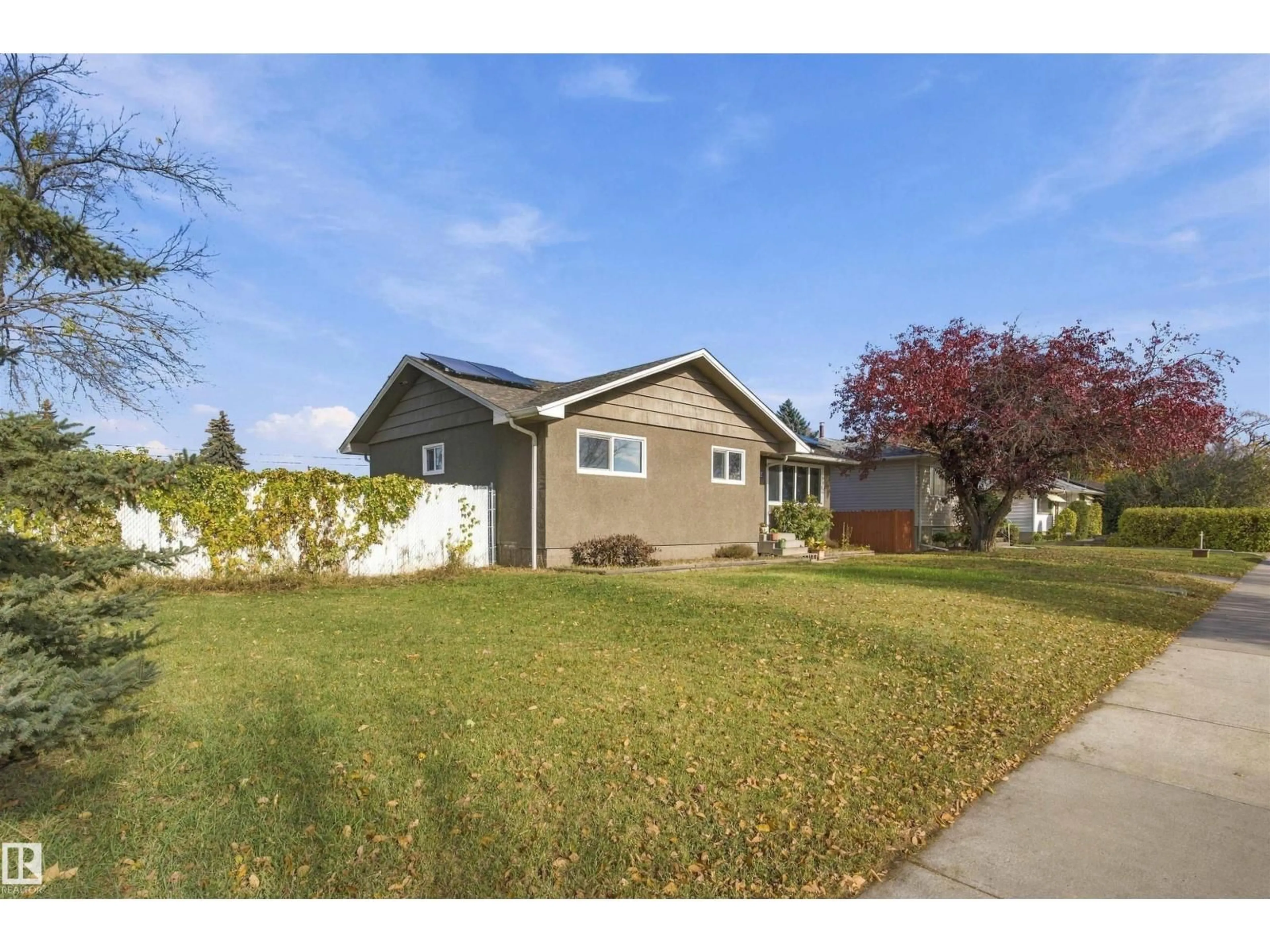 Home with vinyl exterior material, street for 5312 101 AV, Edmonton Alberta T6A0G8