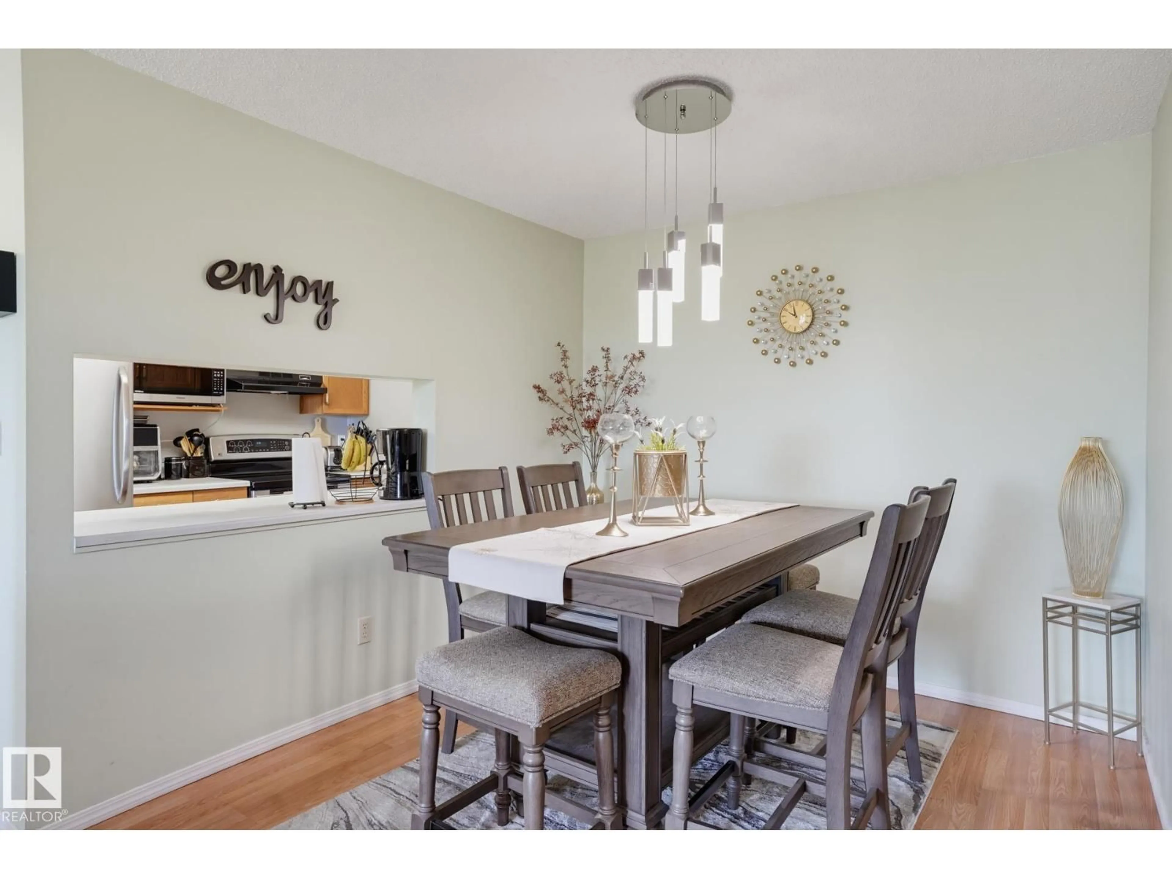 Dining room, wood/laminate floor for #407 - 18020 95 AV NW, Edmonton Alberta T5T6B2