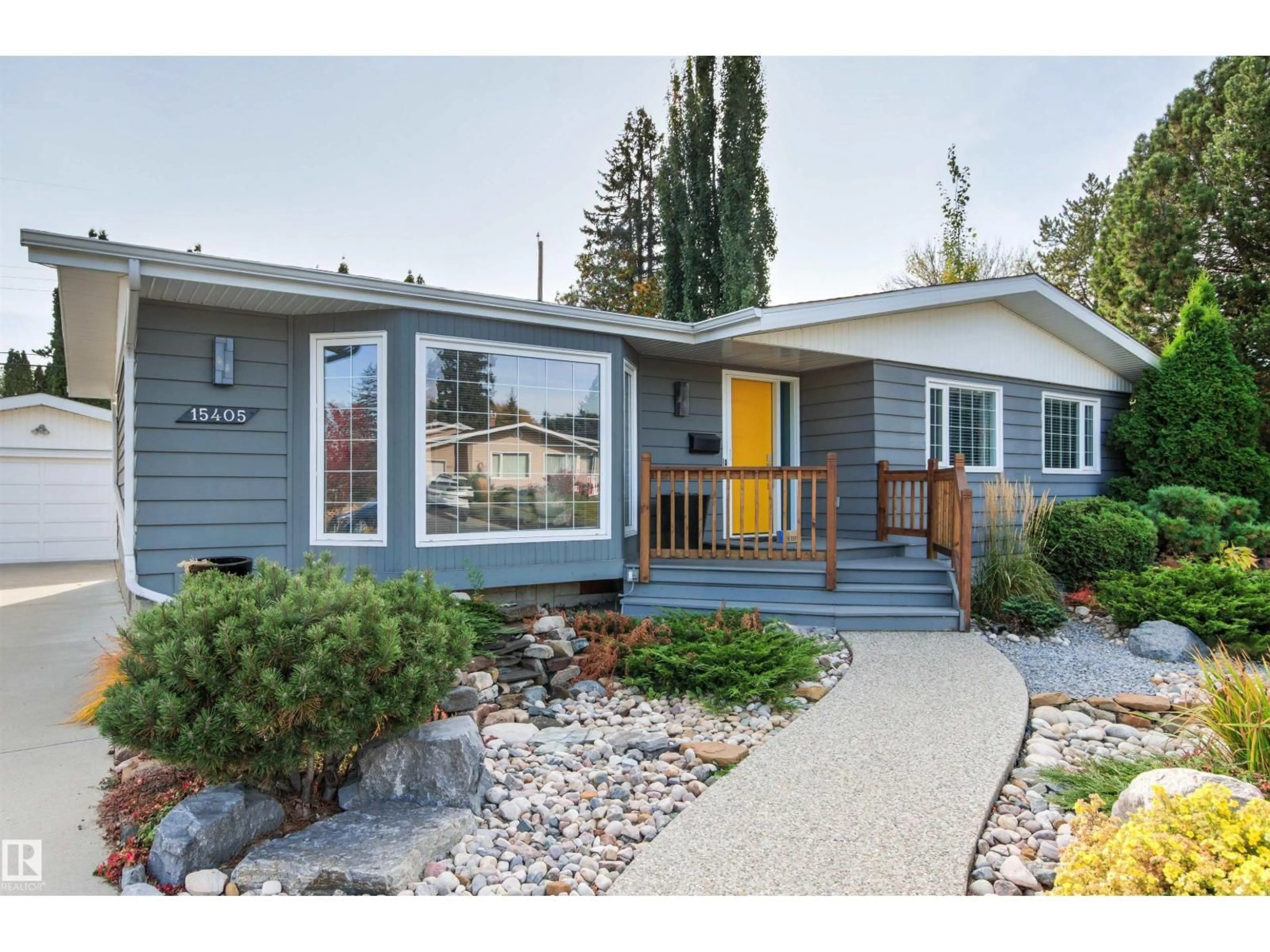 Home with vinyl exterior material, street for 15405 75 AV, Edmonton Alberta T5R2Y9