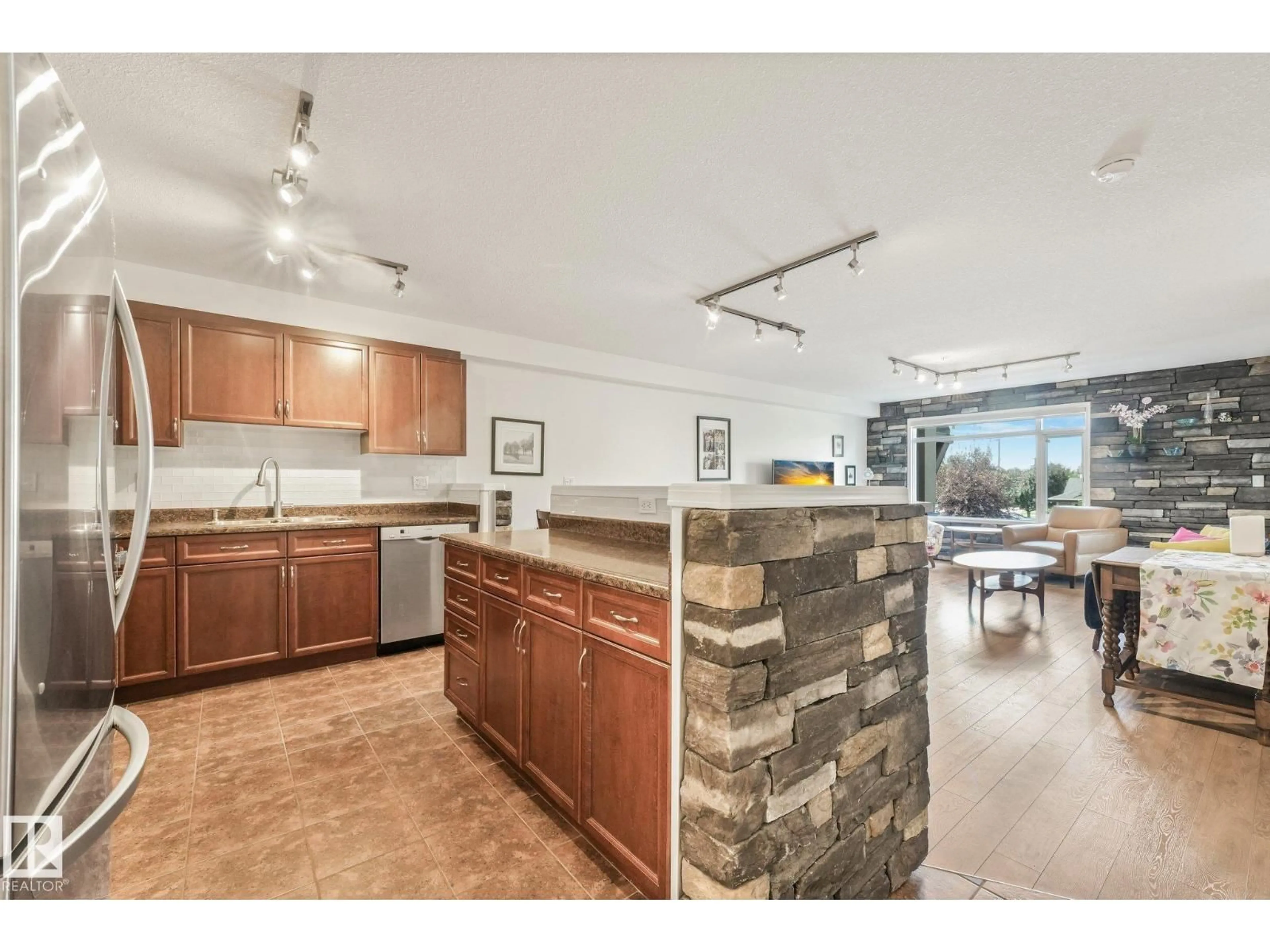 Open concept kitchen, ceramic/tile floor for 209 - 1589 GLASTONBURY BV, Edmonton Alberta T5T2V1