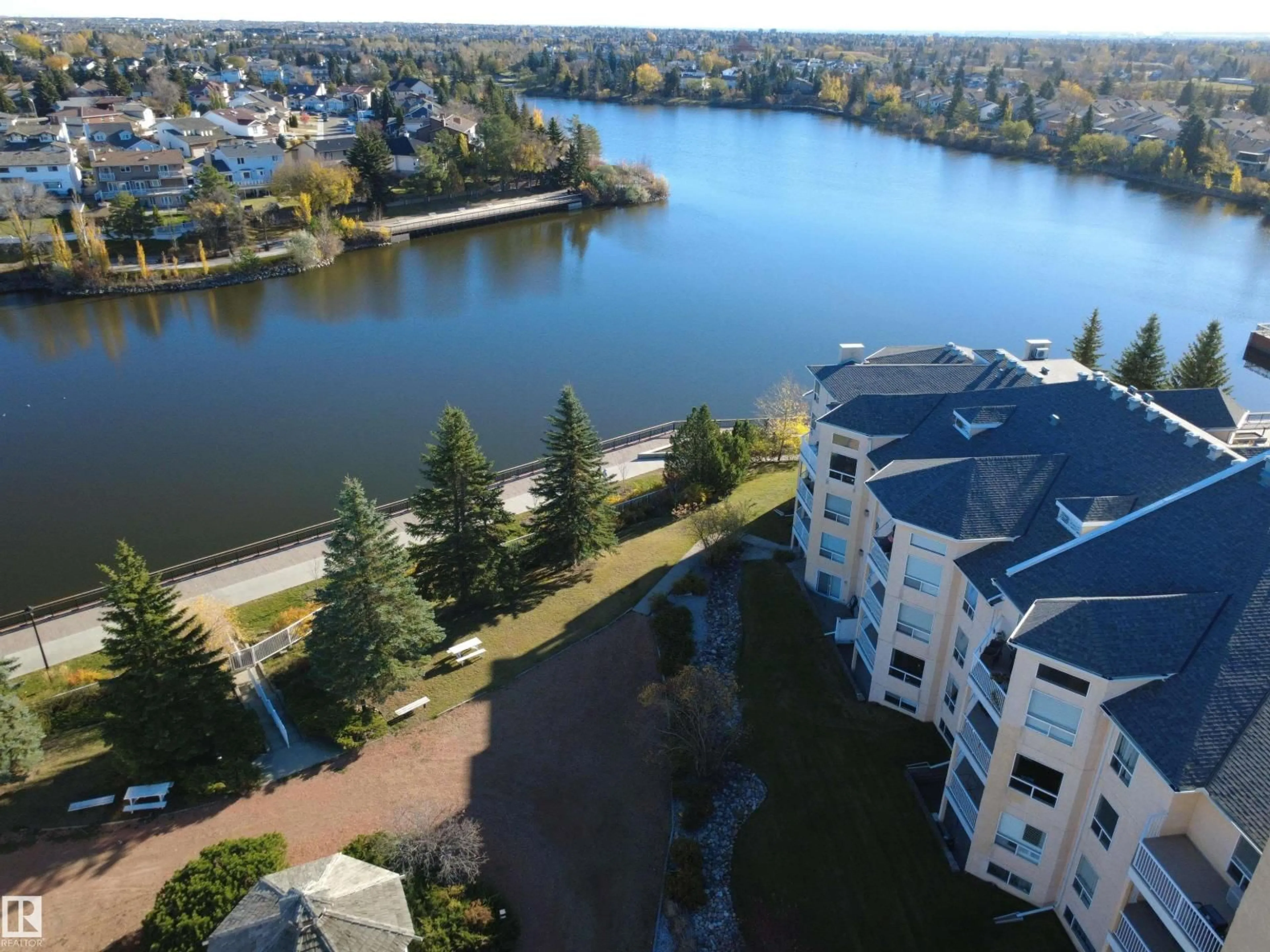 A pic from outside/outdoor area/front of a property/back of a property/a pic from drone, water/lake/river/ocean view for #419 - 15499 CASTLE DOWNS RD, Edmonton Alberta T5X5Y3