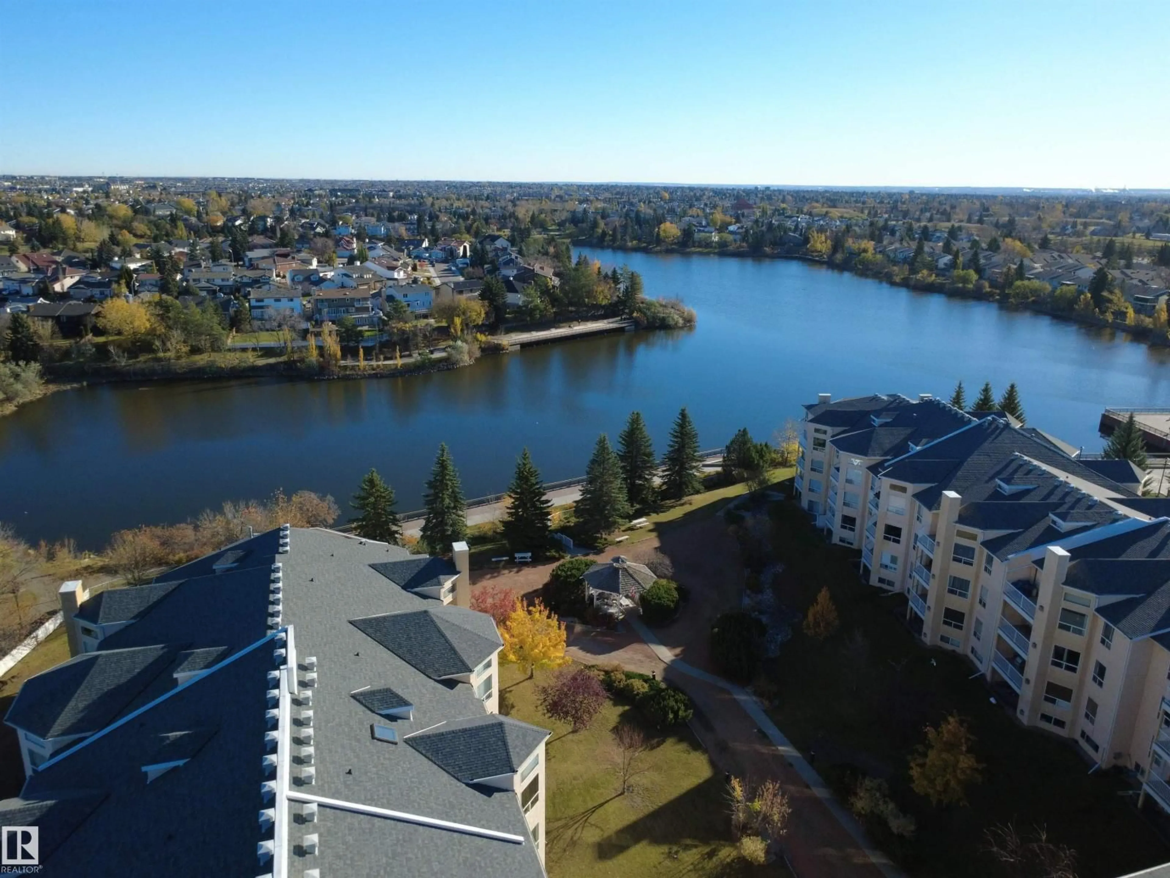 A pic from outside/outdoor area/front of a property/back of a property/a pic from drone, water/lake/river/ocean view for #419 - 15499 CASTLE DOWNS RD, Edmonton Alberta T5X5Y3