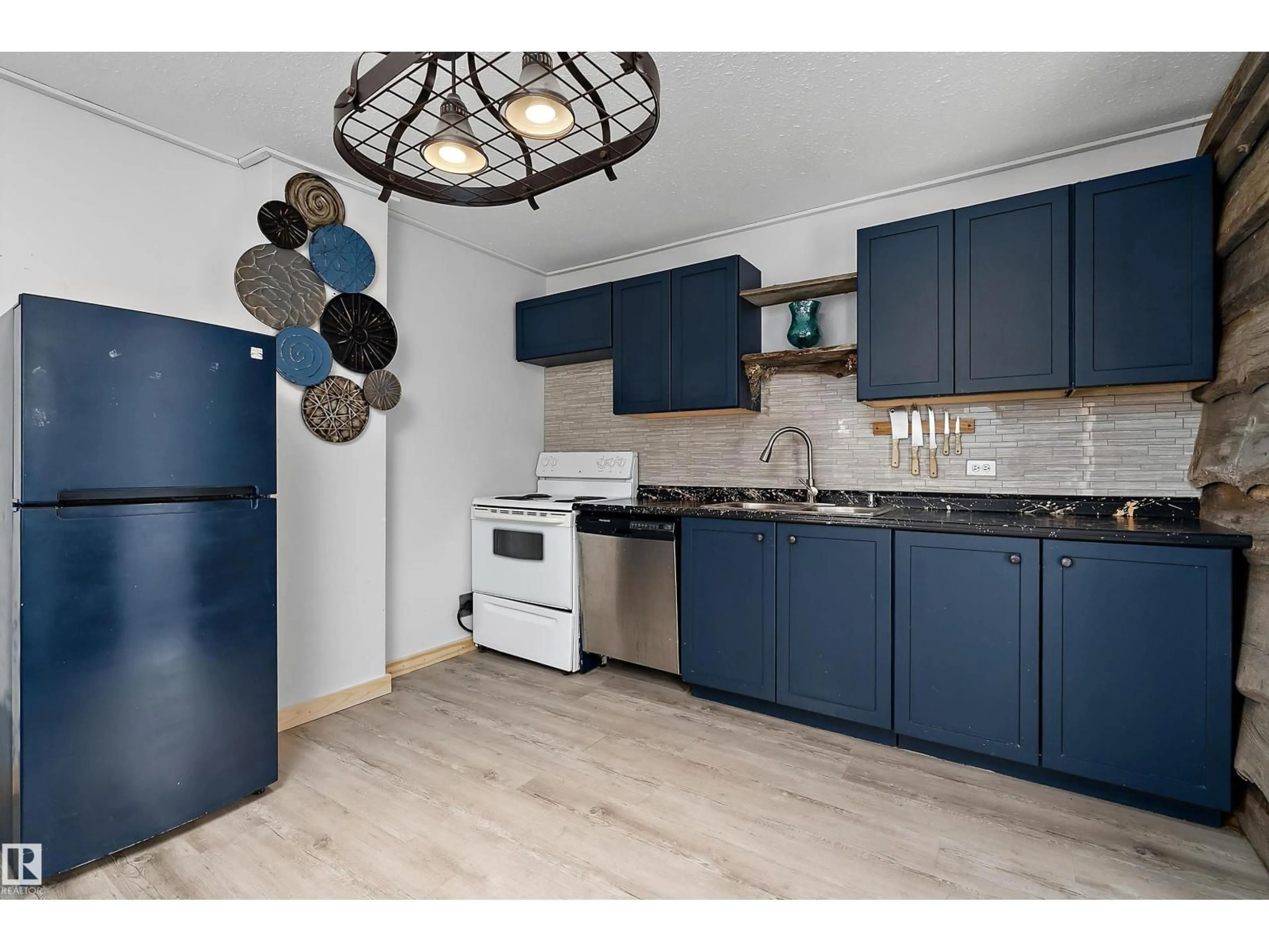 Open concept kitchen, unknown for 3913 53A ST, Wetaskiwin Alberta T9A1R7