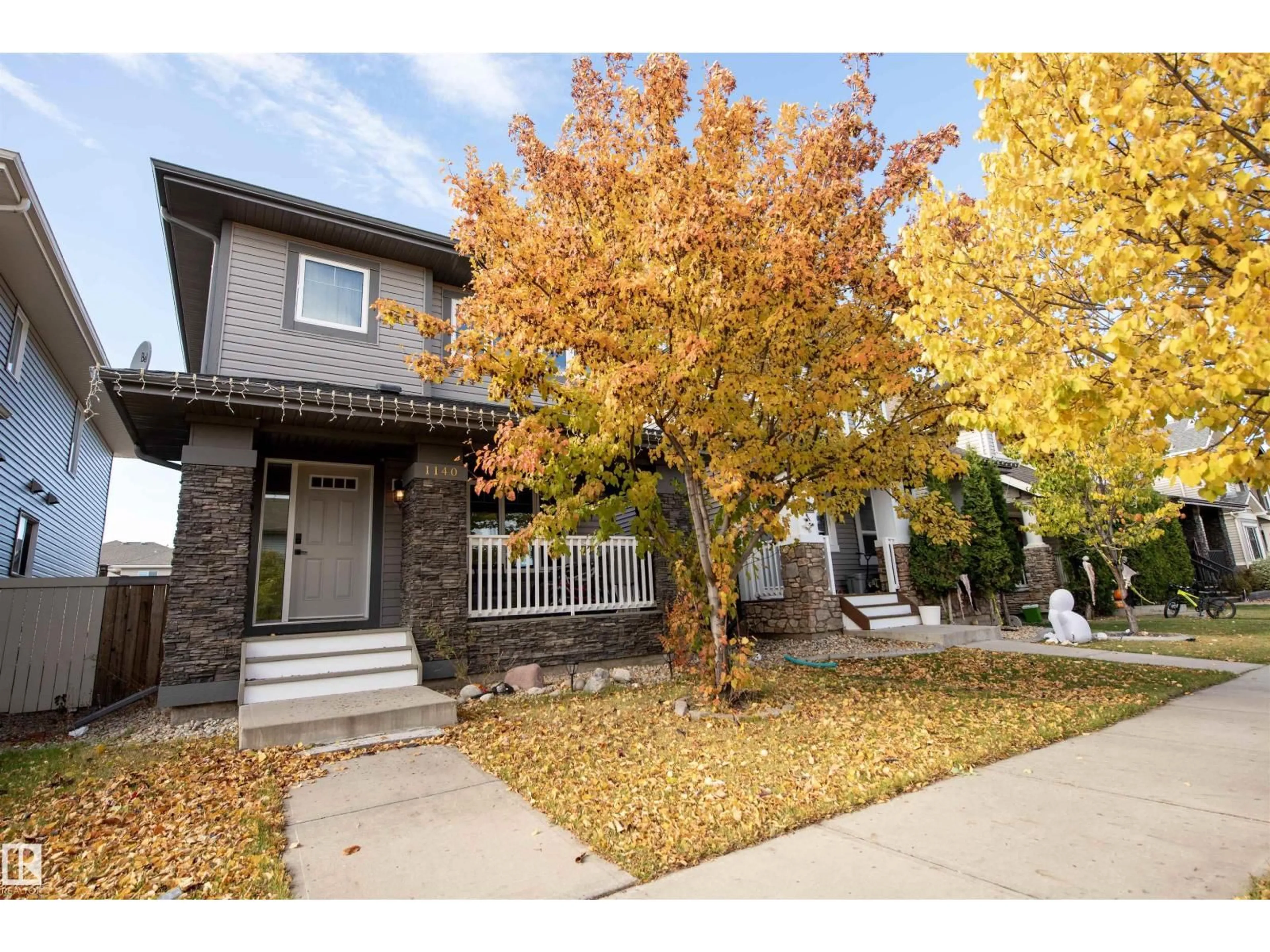 Home with vinyl exterior material, street for SW - 1140 161 ST, Edmonton Alberta T6W2W6