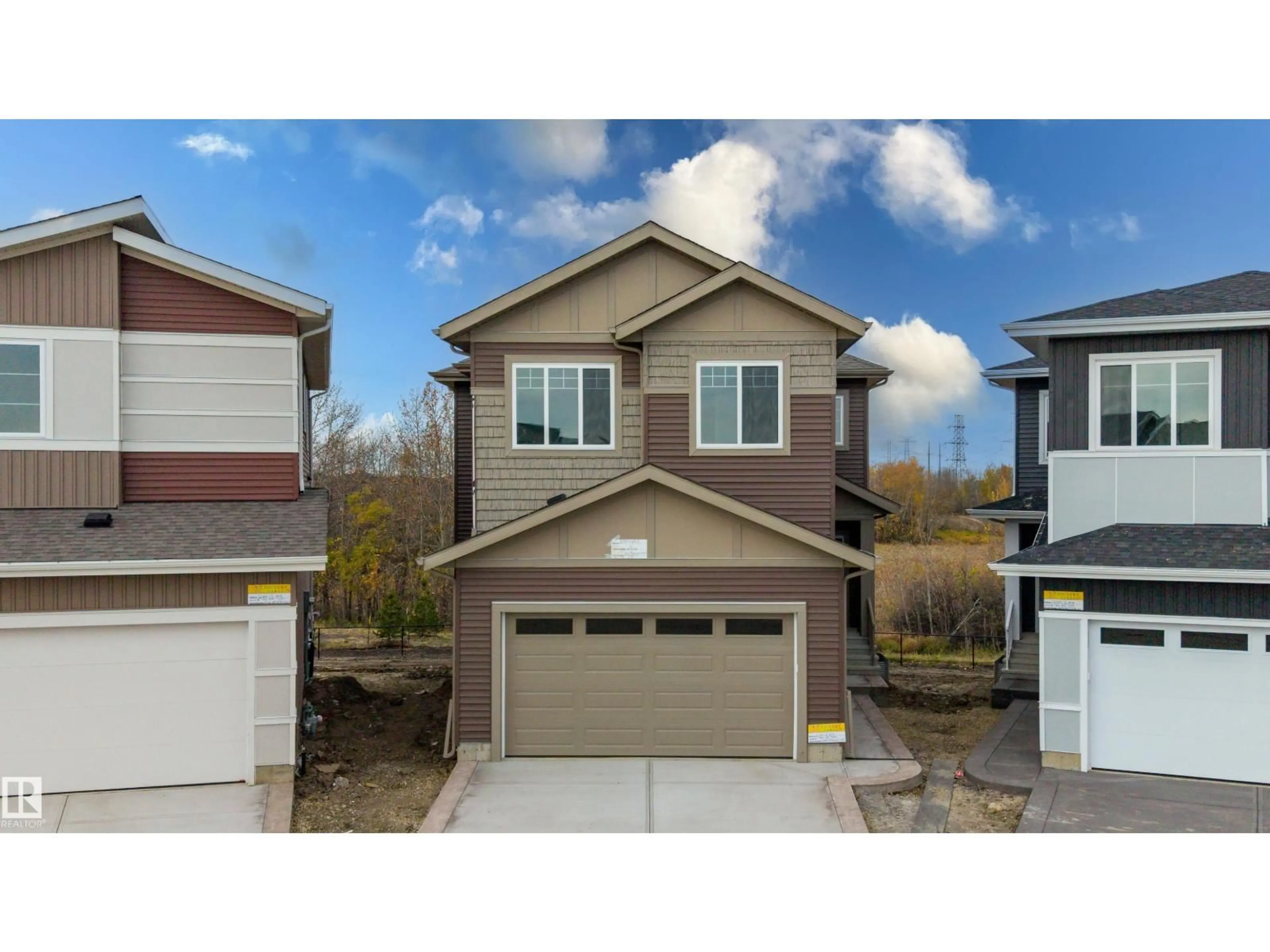Home with vinyl exterior material, street for SW - 2159 1 AV, Edmonton Alberta T6X3P6