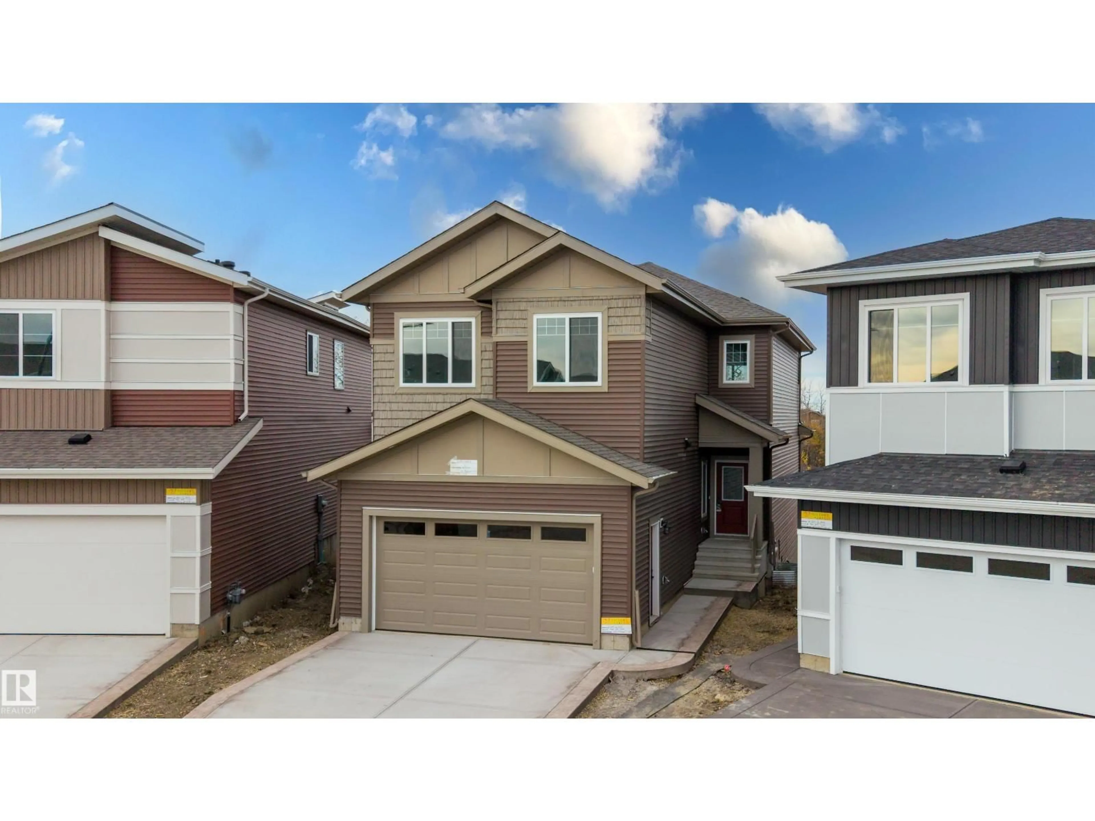 Home with vinyl exterior material, street for SW - 2159 1 AV, Edmonton Alberta T6X3P6