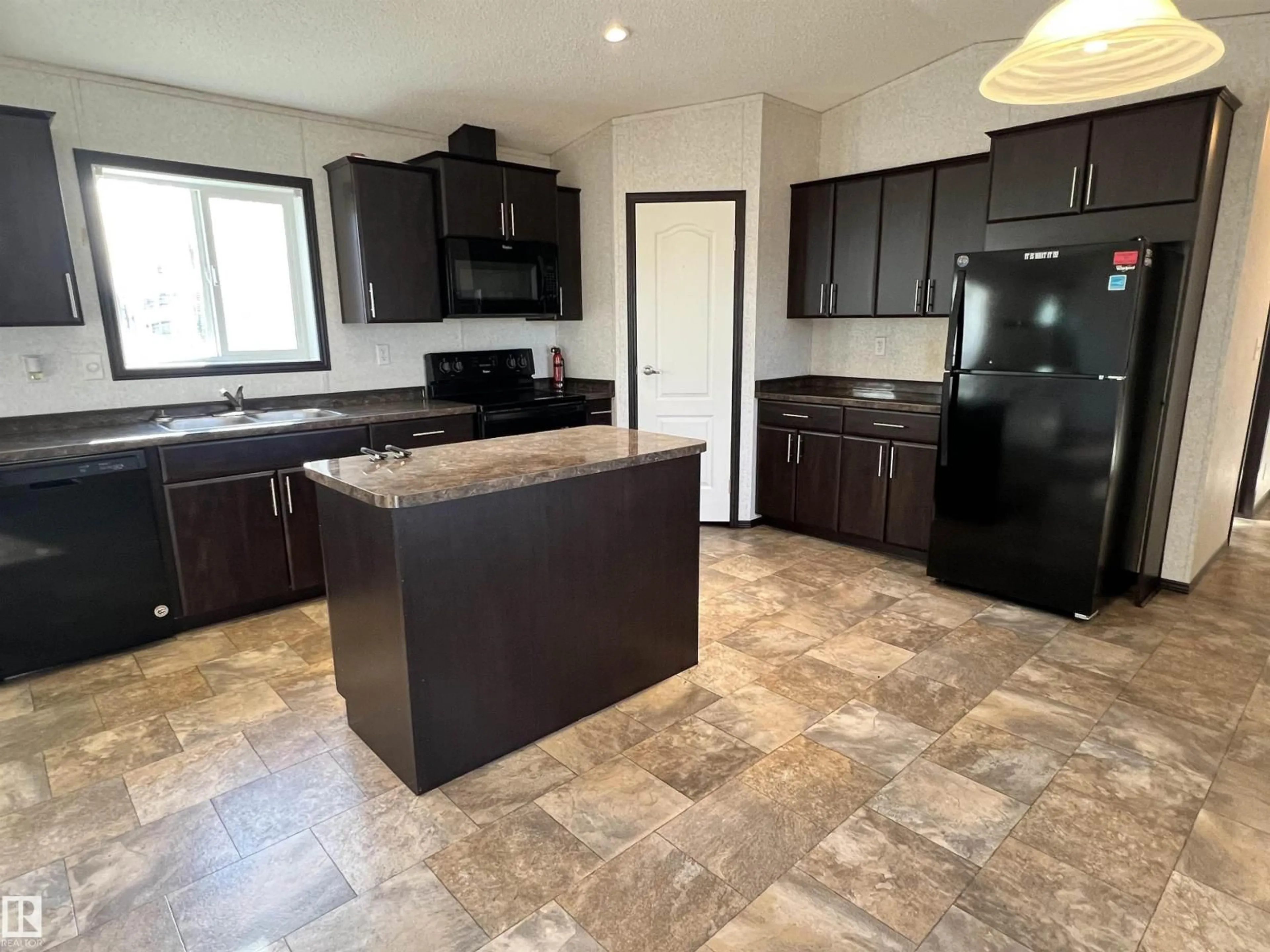 Open concept kitchen, ceramic/tile floor for 3314 RAIL GRADE RD, Rural Lac Ste. Anne County Alberta T0E0A0