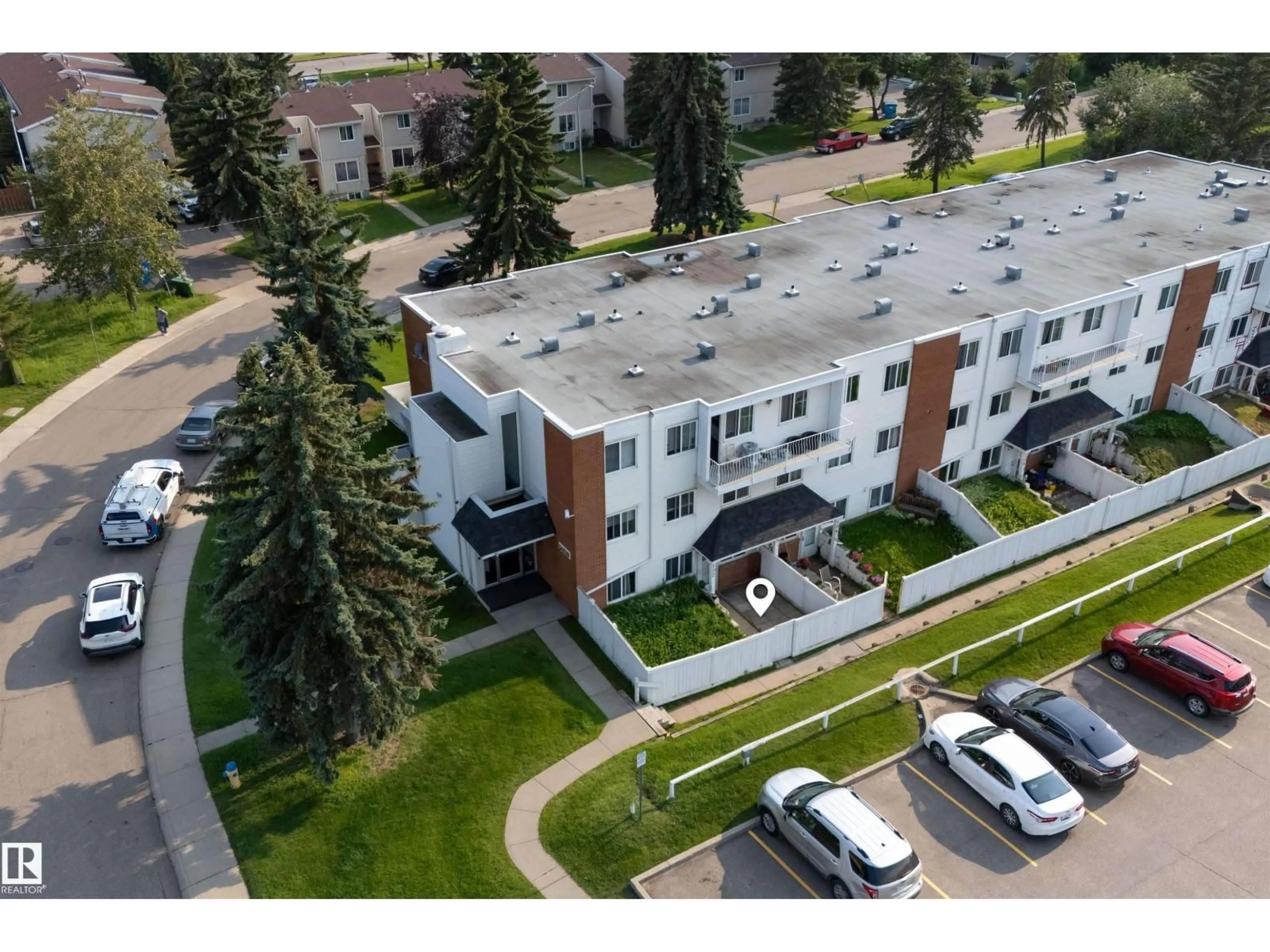 A pic from outside/outdoor area/front of a property/back of a property/a pic from drone, unknown for #102 - 14520 52 ST, Edmonton Alberta T5A3K5