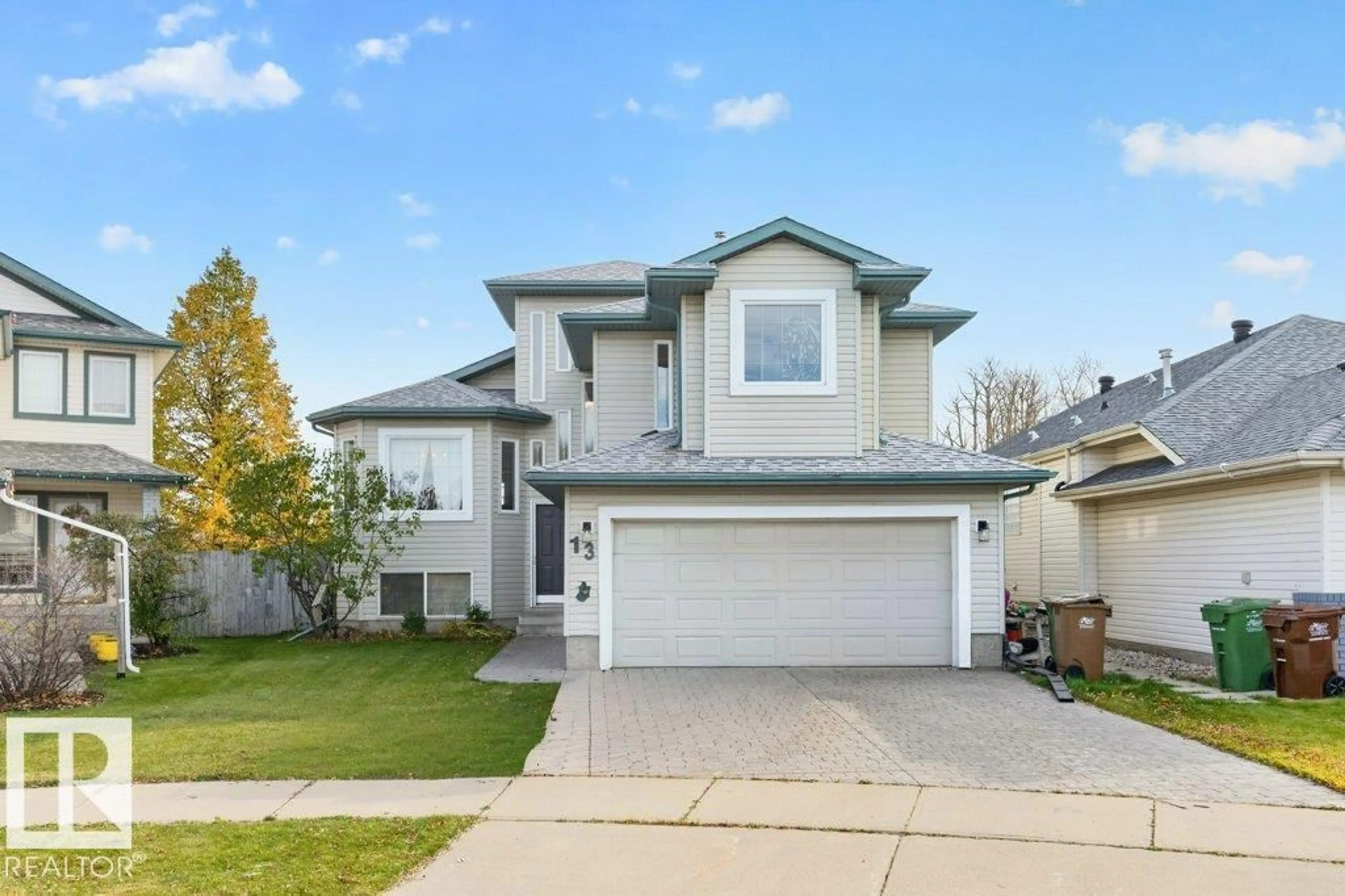 Home with vinyl exterior material, street for 13 HARVEST CO, St. Albert Alberta T8N6W8